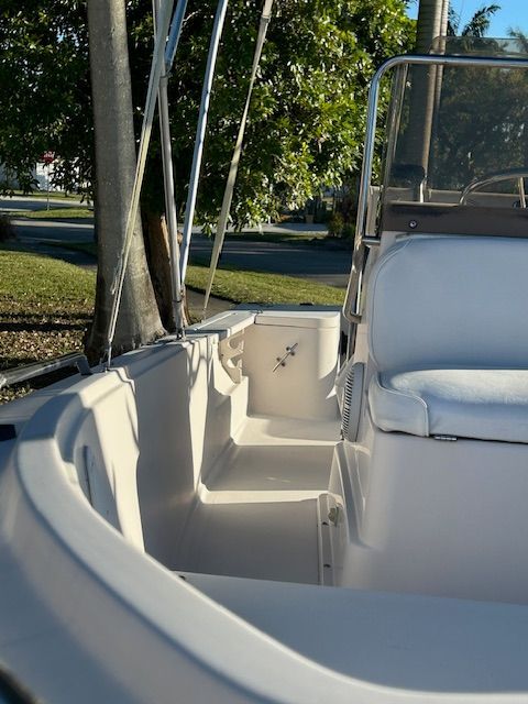 Interior view of a 1994 Aquasport Osprey boat in sunlight.