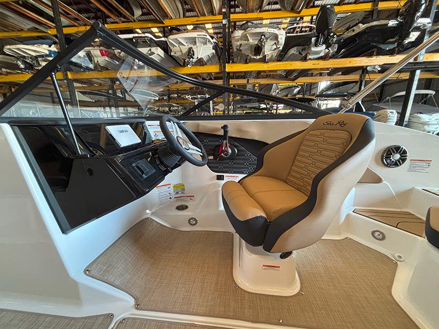 2025 Sea Ray SPX 190 Outboard boat interior with steering wheel and captain's seat.