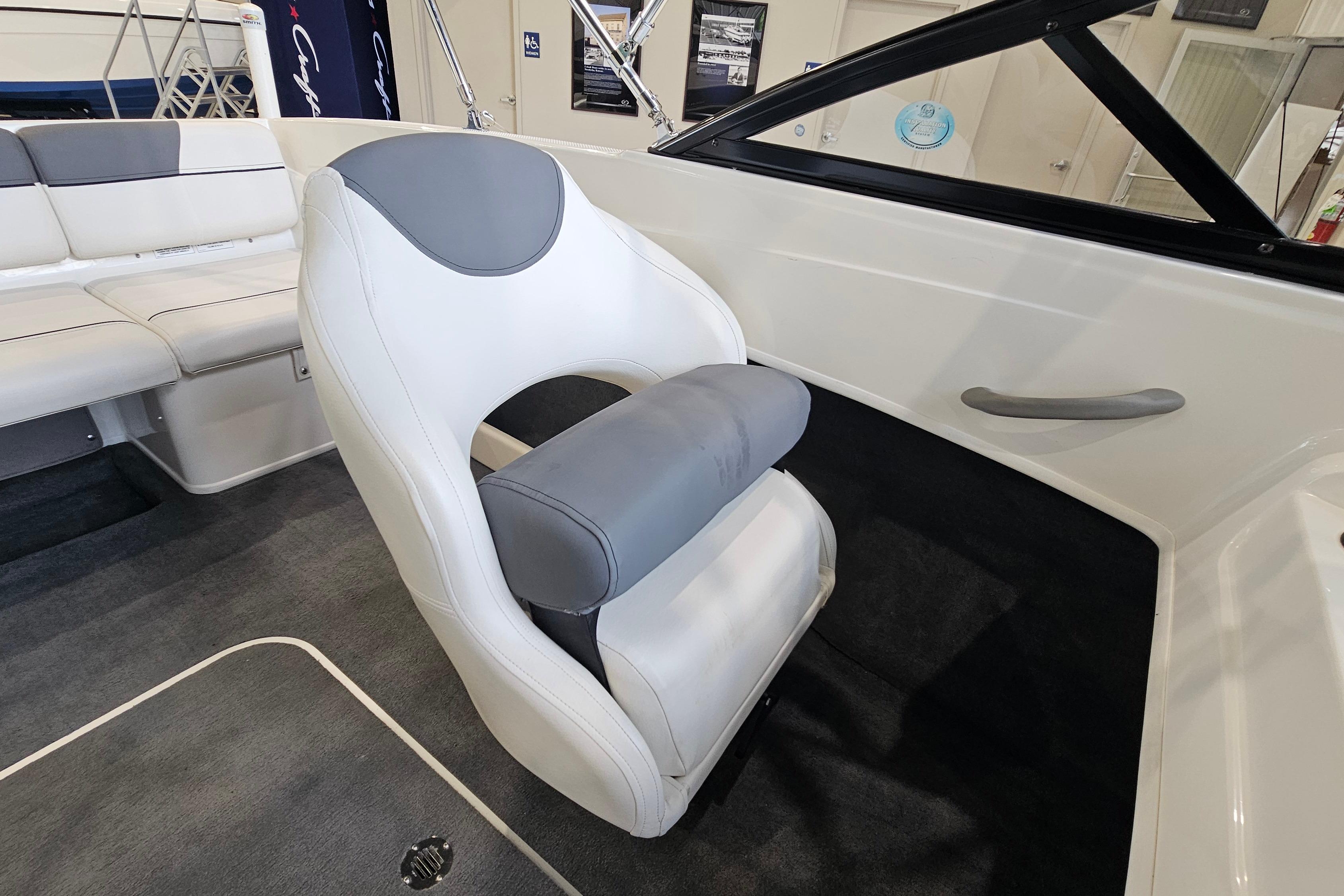 2019 Bayliner 170 Bowrider interior with gray and white seating, showcasing modern design.