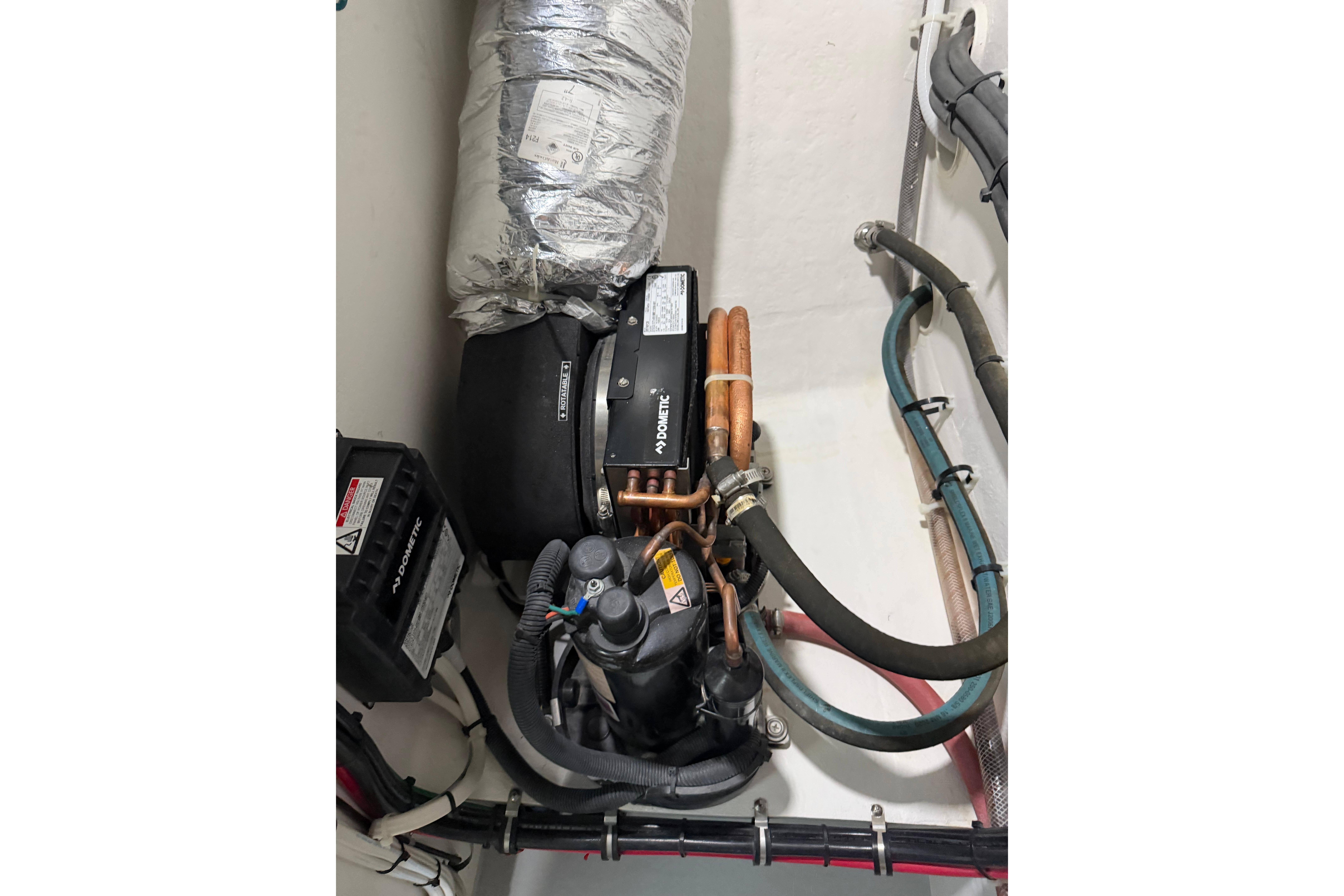Engine compartment of 2018 H&H Marine Osmond Beal boat with Dometic components.