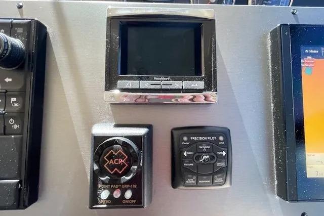 Control panel of a 2016 Sea Ray Sundancer 510 yacht with navigation and pilot systems.
