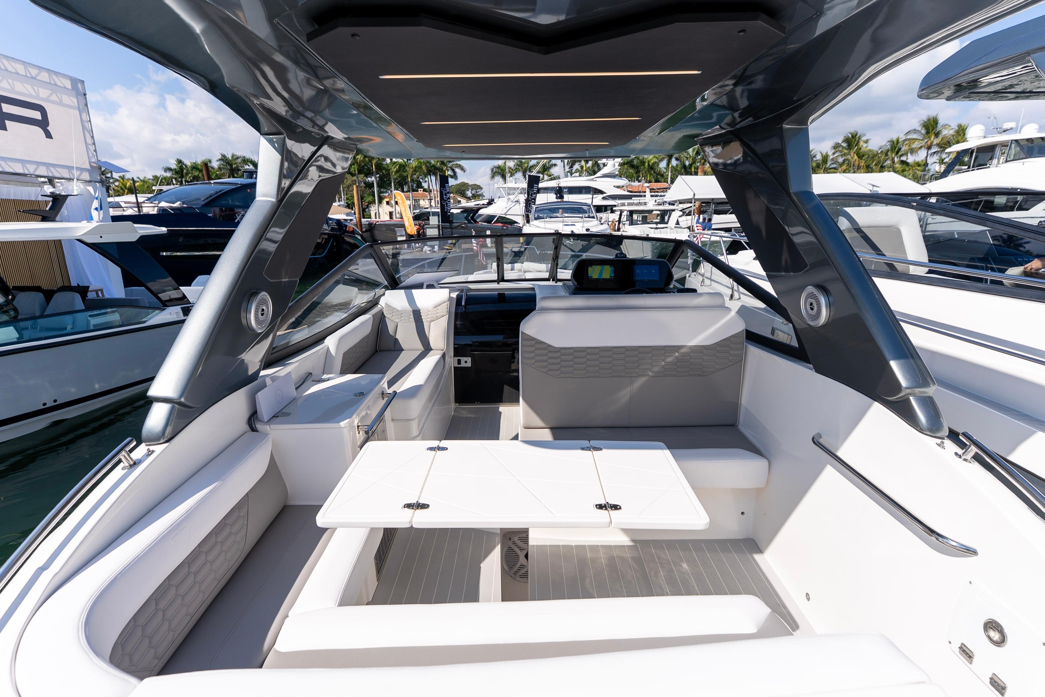Luxurious interior of 2026 Valiatt 350GT yacht, featuring sleek seating and modern design elements.