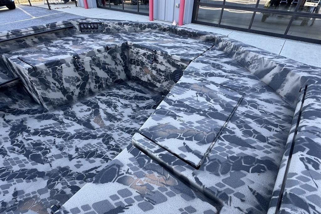 Camouflage interior of 2025 Havoc 1860 boat, showcasing modern design and functionality.