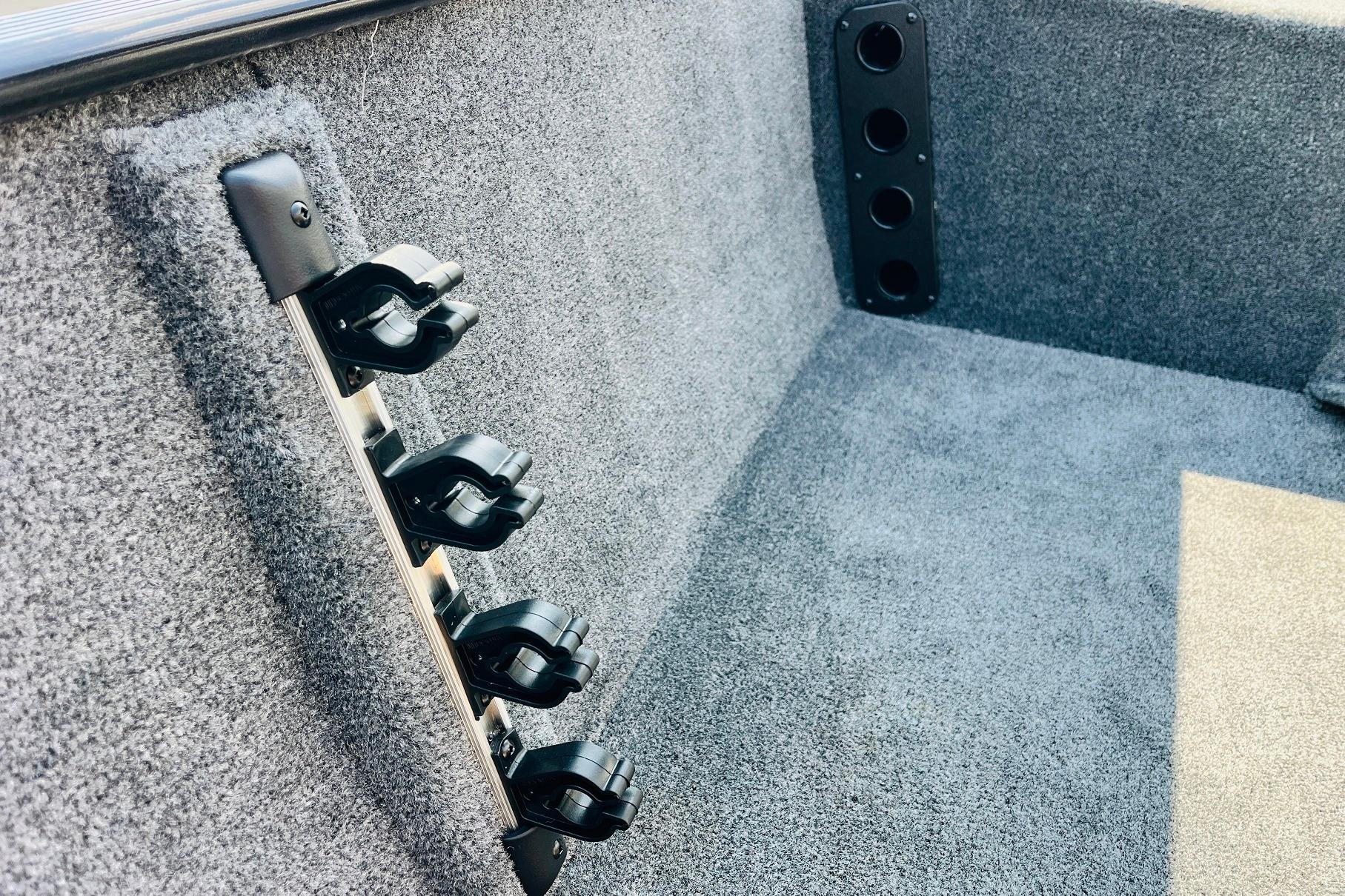 Interior of 2026 Tracker Bass Tracker Classic XL boat with rod holders.