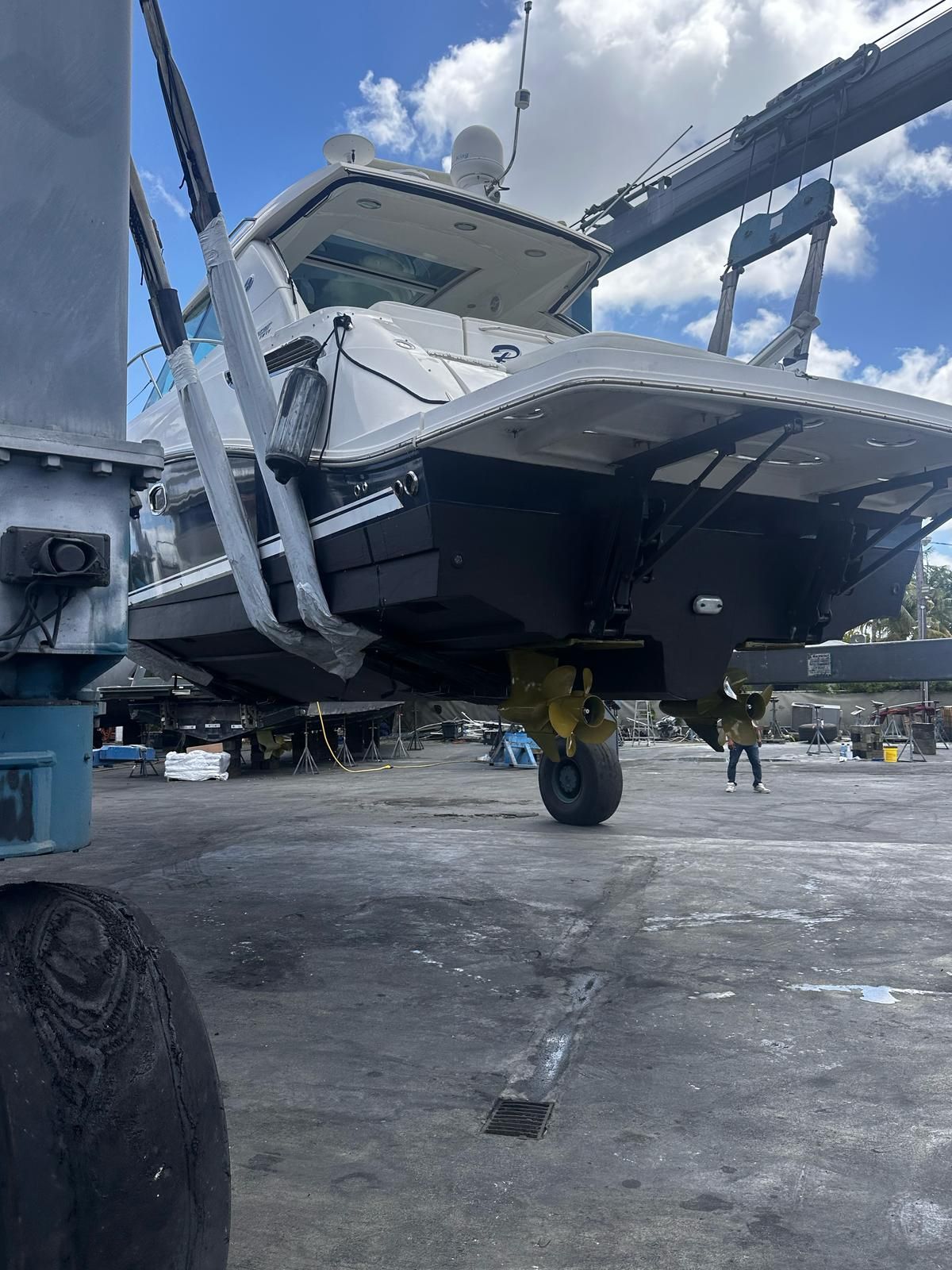 2010 Sea Ray 450 boat in a shipyard.