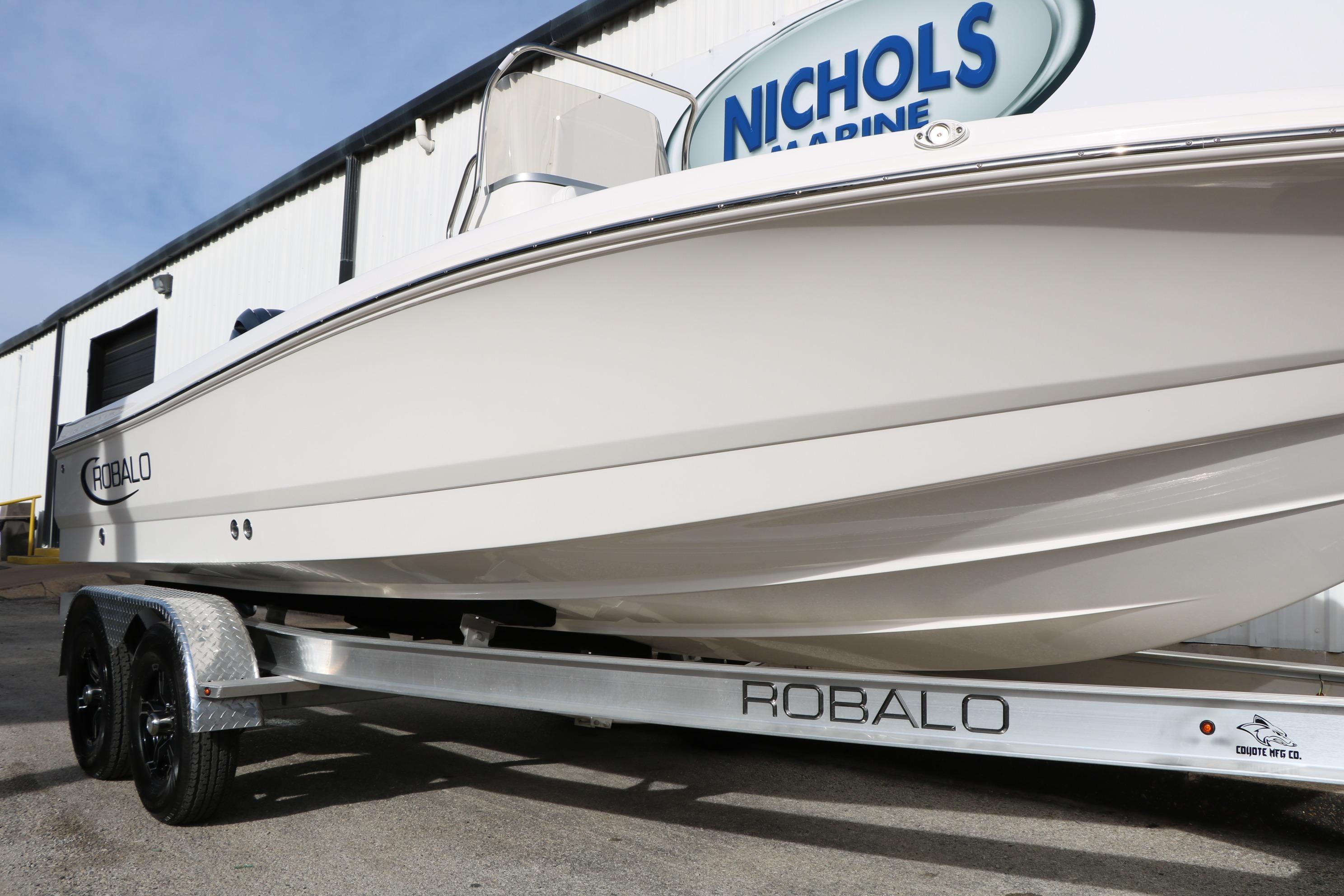 2026 Robalo 206 Cayman boat on trailer at Nichols Marine dealership.