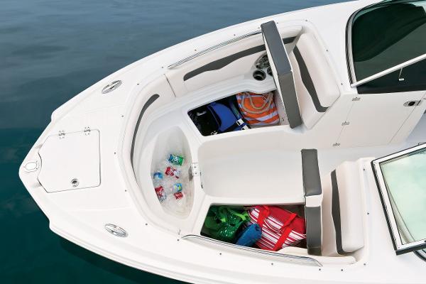 Manufacturer Provided Image: 2016 Chaparral 246 SSi boat interior with storage compartments and seating.