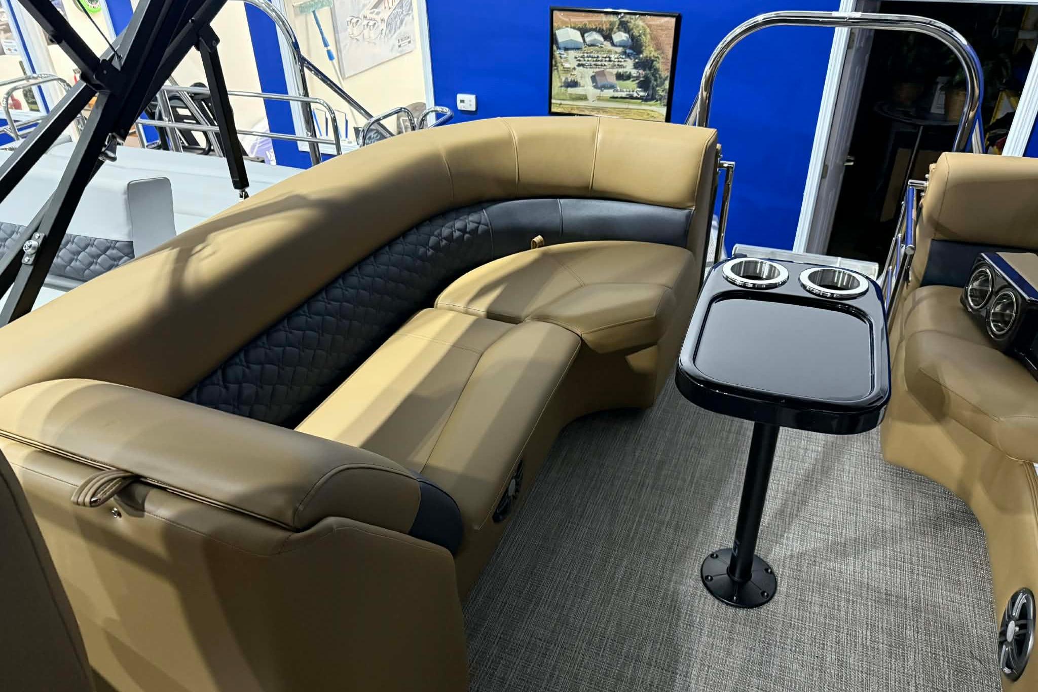 Luxurious seating area on 2026 Manitou Encore VP 230 pontoon boat.