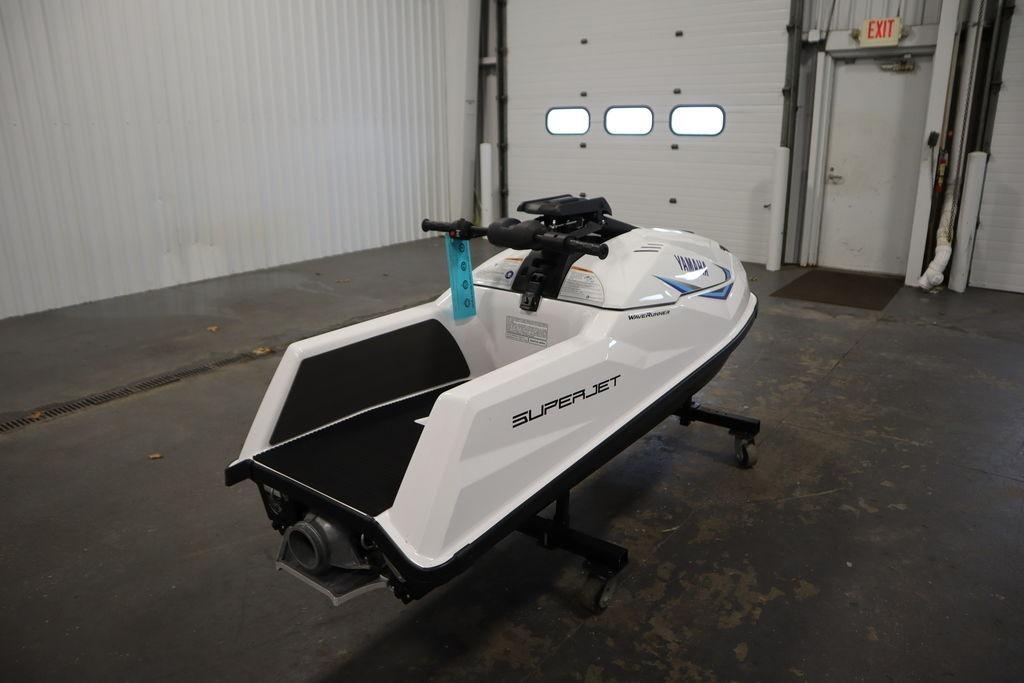 2025 Yamaha WaveRunner SuperJet in a garage setting, showcasing sleek design and modern features.
