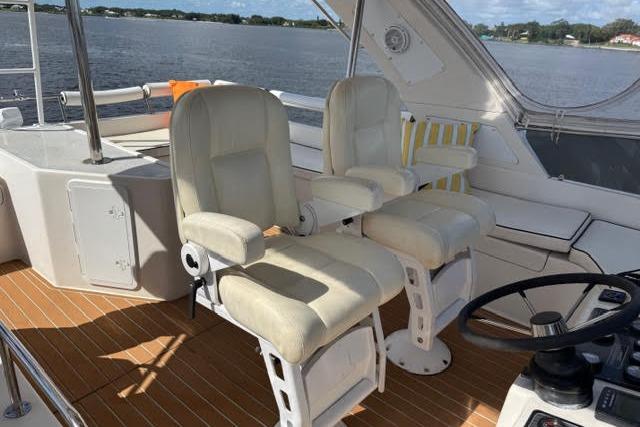 Luxury Africat Marine 420 yacht interior with plush seating, 2007 model, overlooking serene waters.