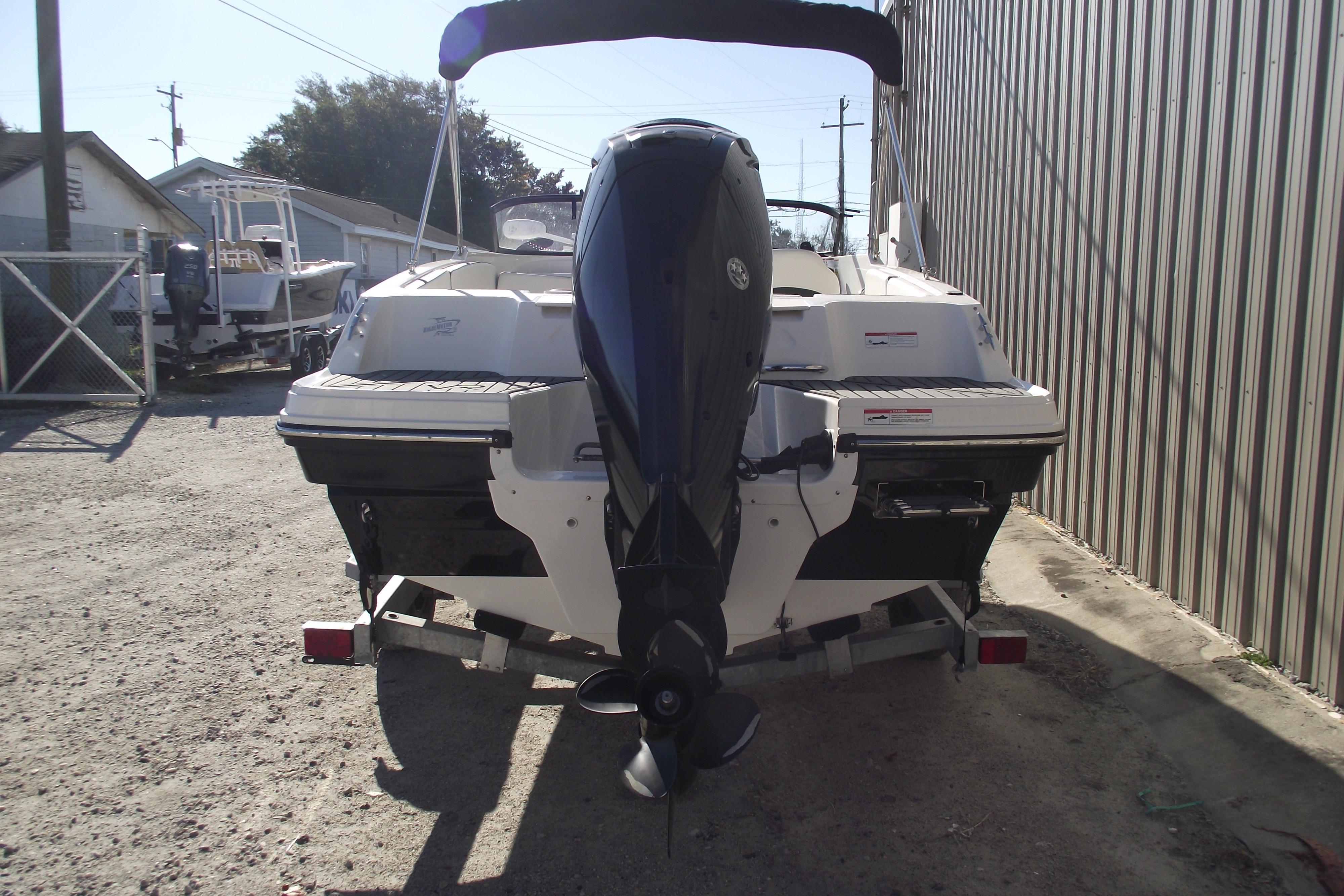 2022 Bayliner VR4 Bowrider OB on trailer, rear view with outboard motor.