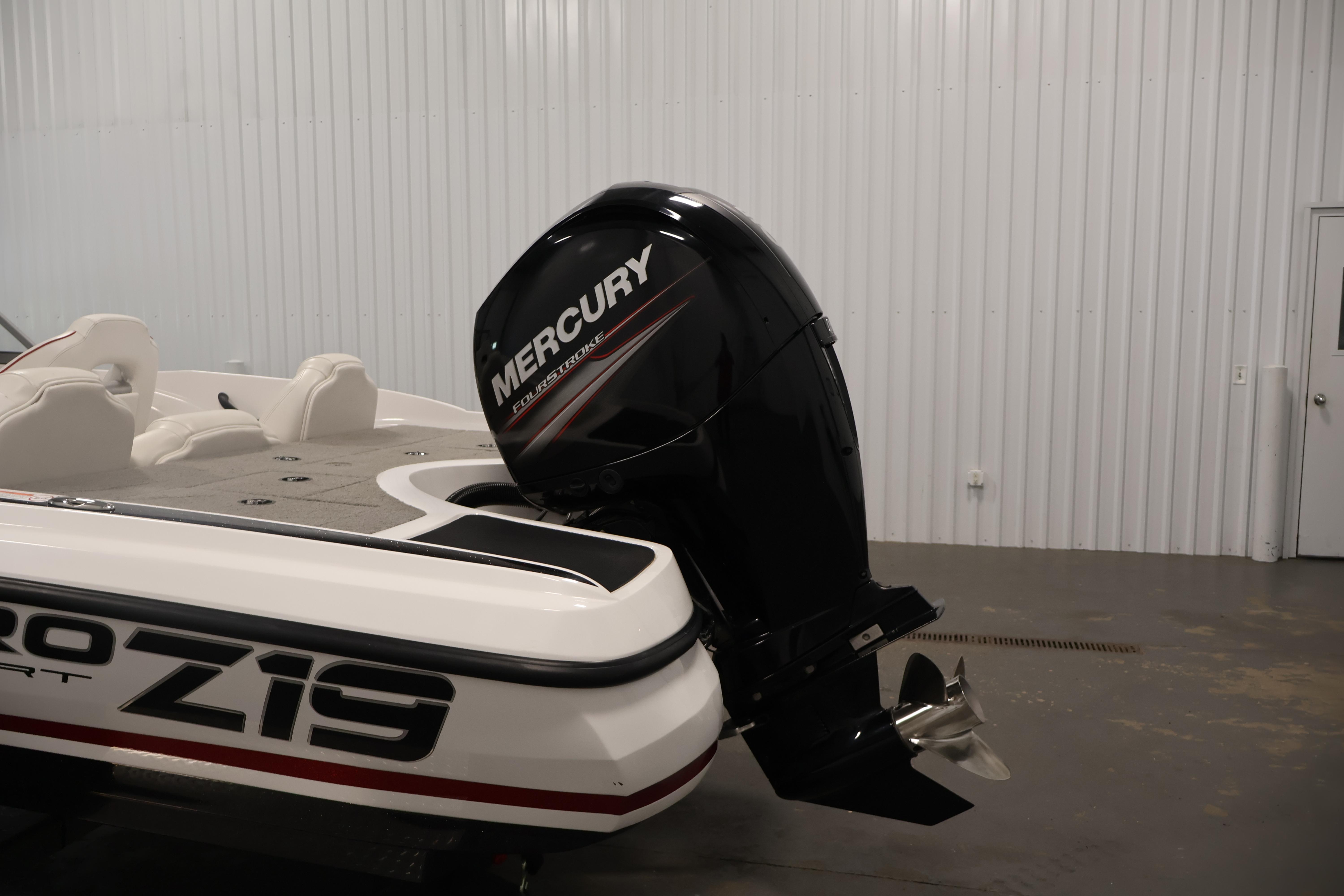 2019 Nitro Z19 Sport boat with Mercury FourStroke engine in a garage.