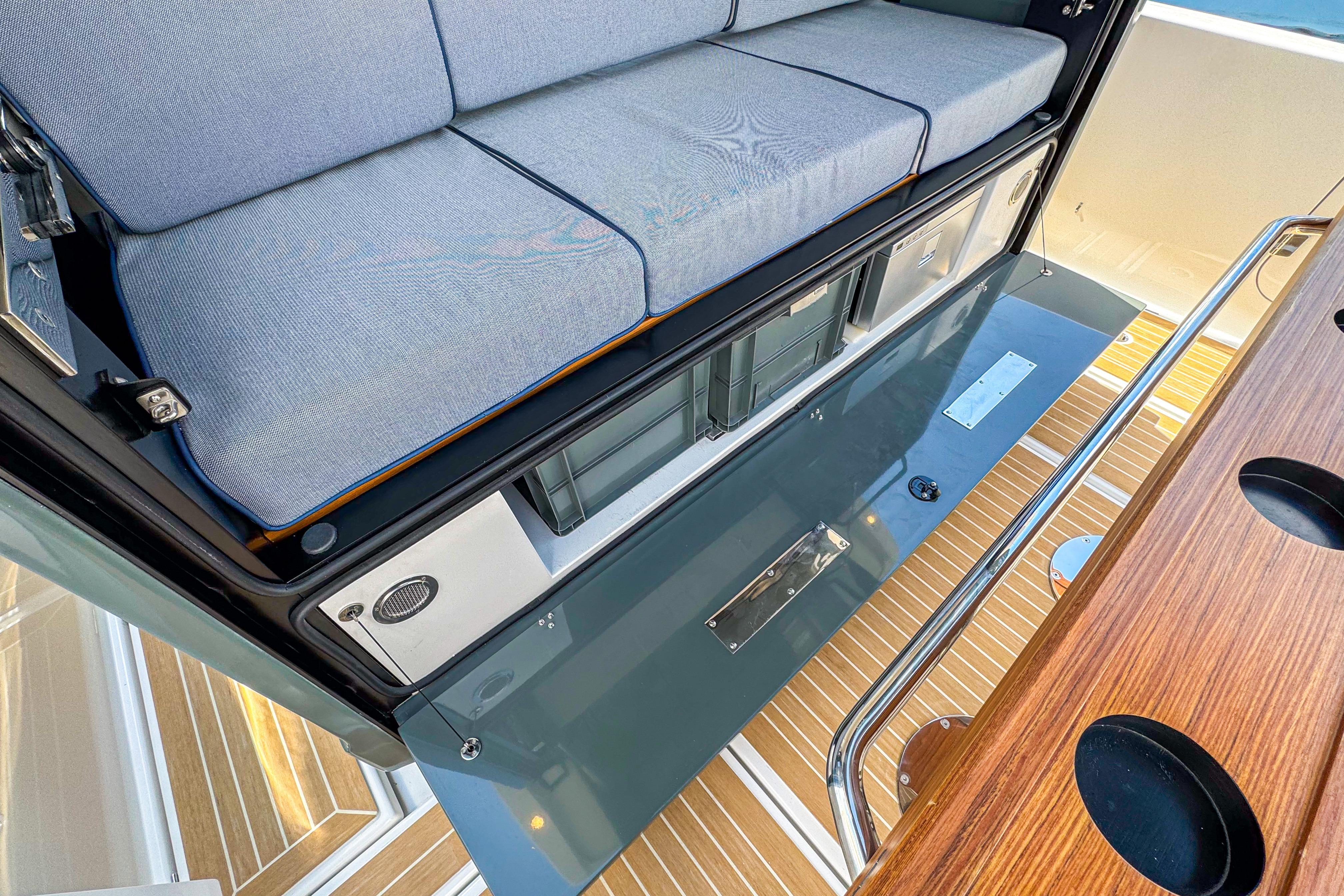 Interior view of Aiata Wayfinder 38 Cabin 2025, featuring sleek seating and modern design elements.