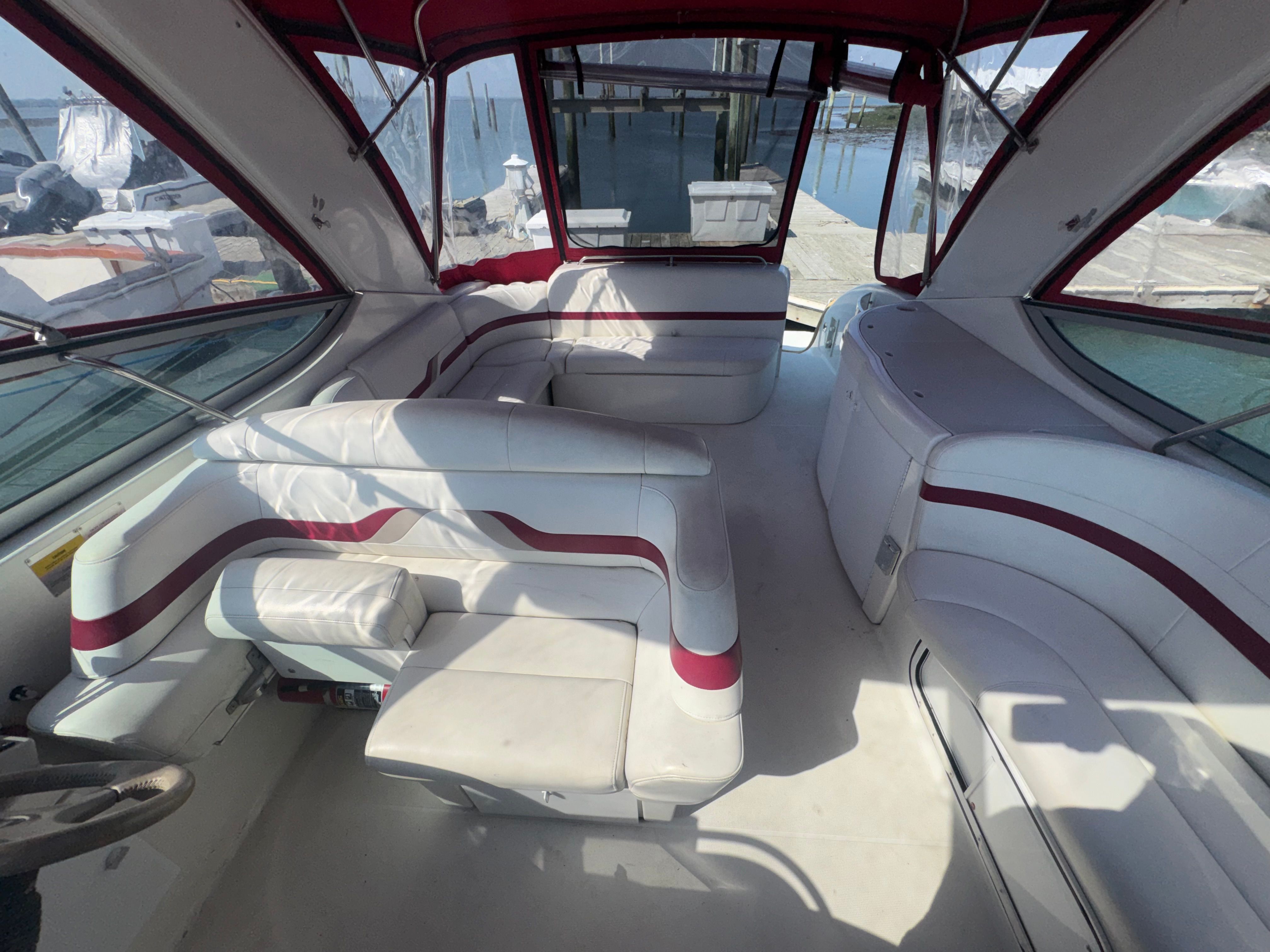 Interior of a 2001 Formula 37 SUPER SPORT yacht with white seating.