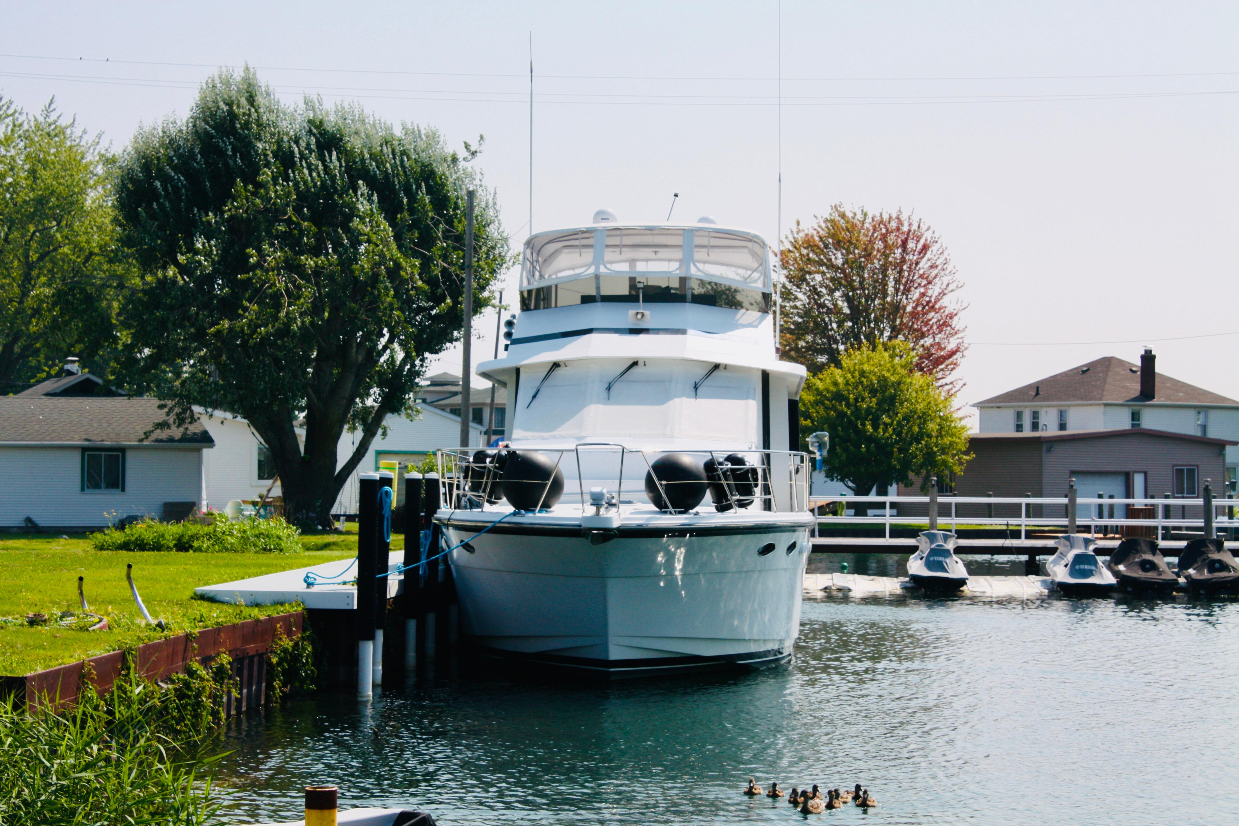 Jefferson 56 Rivanna yacht docked near residential area, 2000 model.