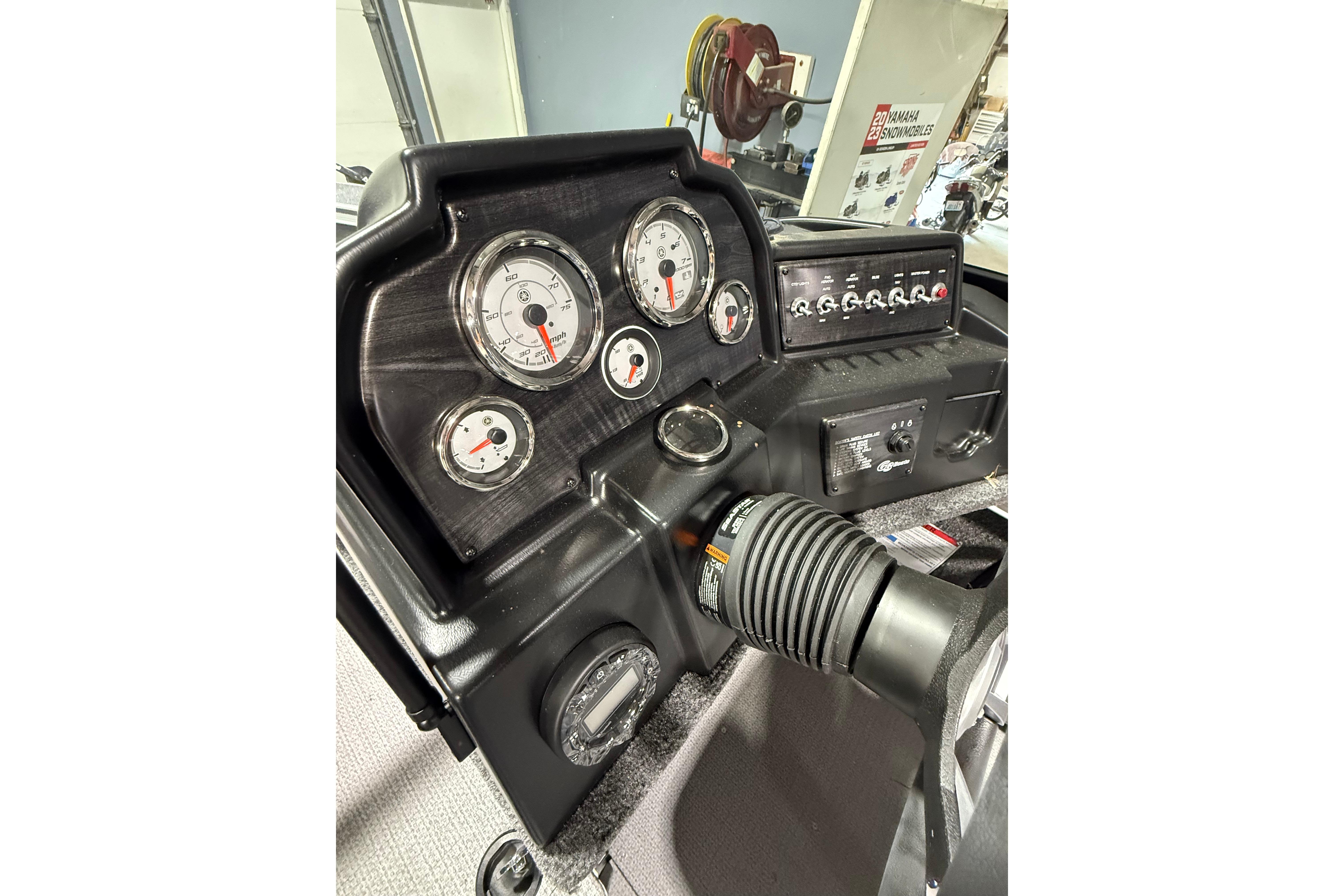 Dashboard of 2025 G3 Angler V1850 SF boat with gauges and controls.
