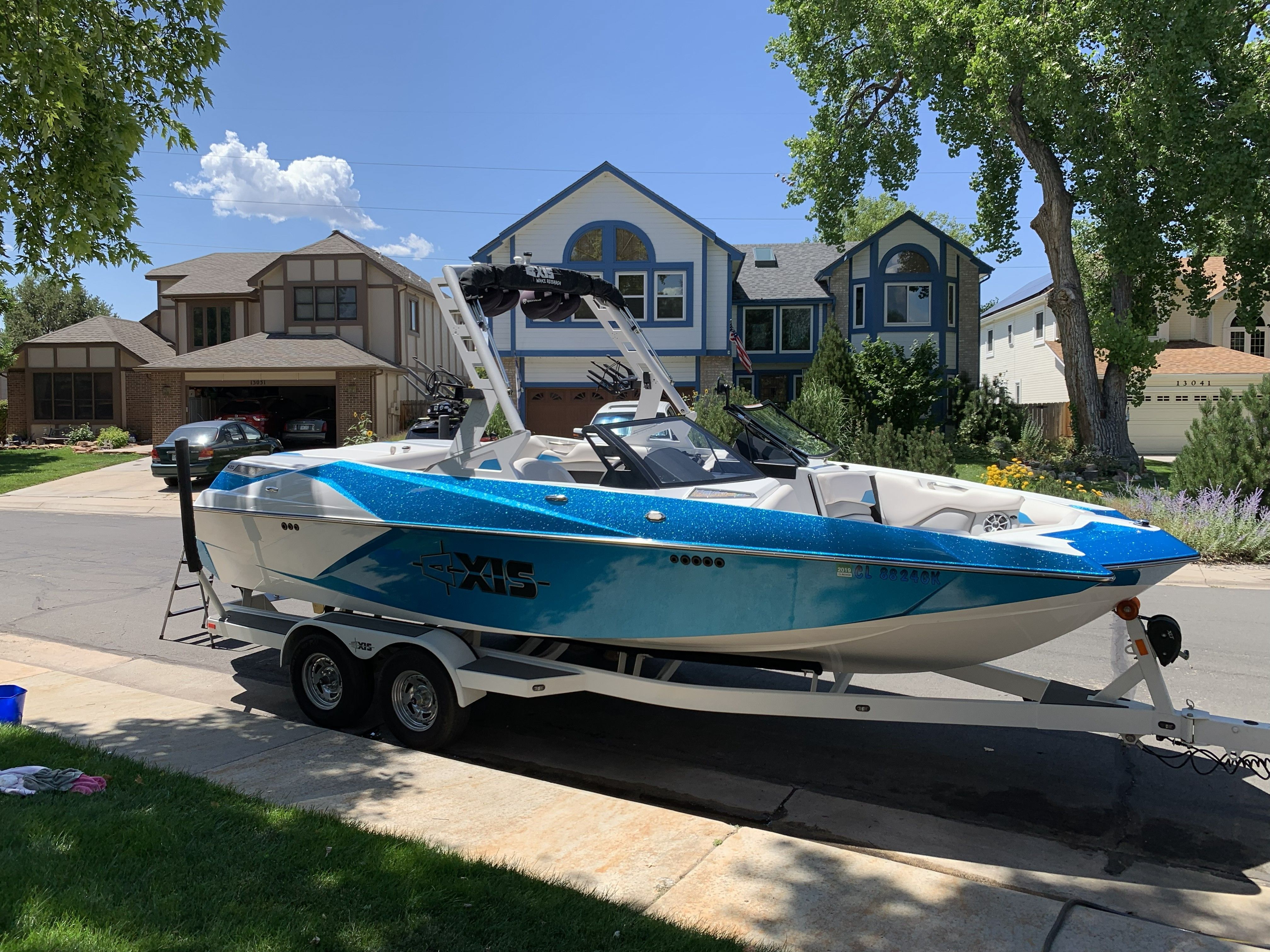 2018 Axis A22 on a trailer in a residential area.