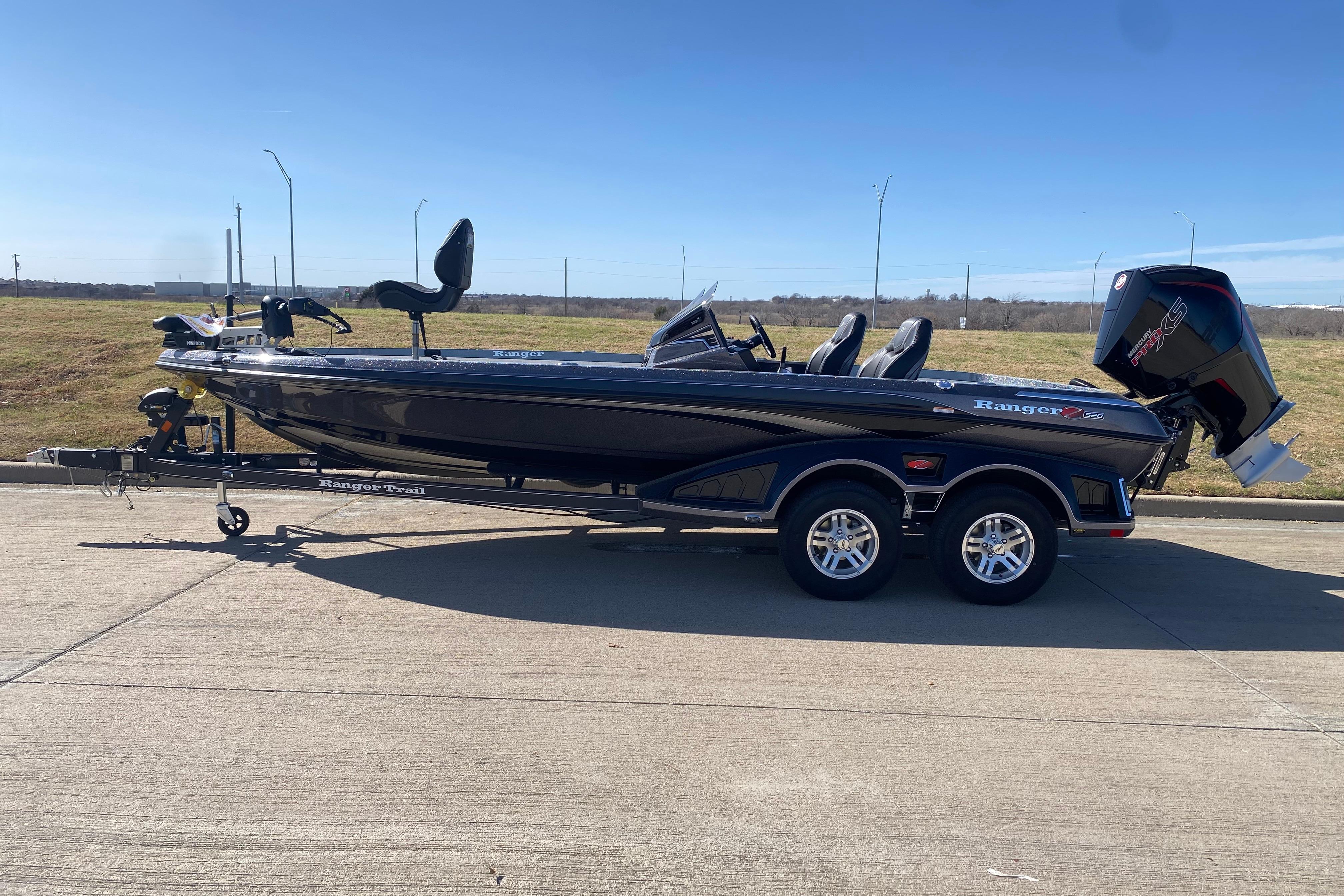 2025 Ranger Z520 boat on trailer, parked on a sunny day.