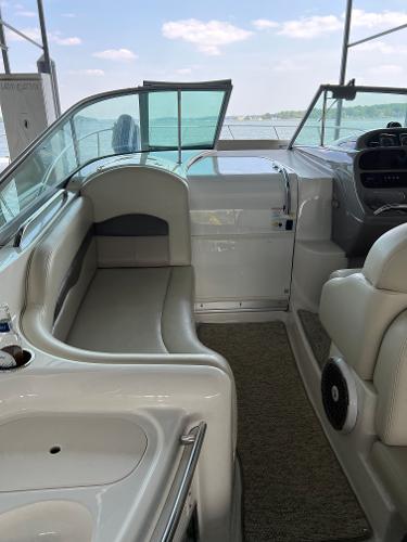 Interior of a 2008 Chaparral Signature 310 boat with seating area.