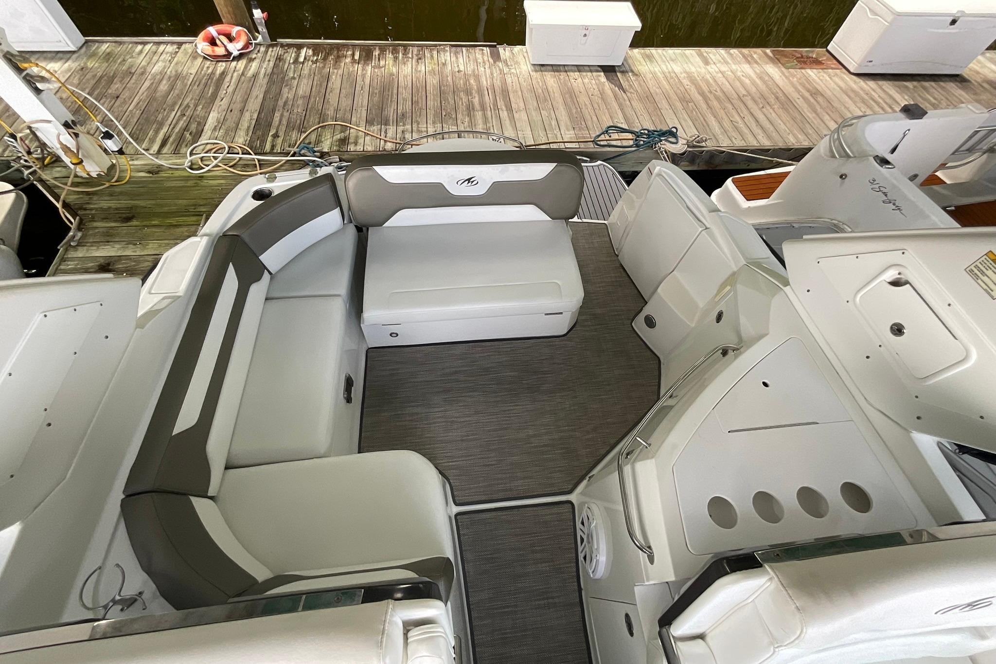 2019 Monterey 335 Sport Yacht interior with spacious seating and modern design.