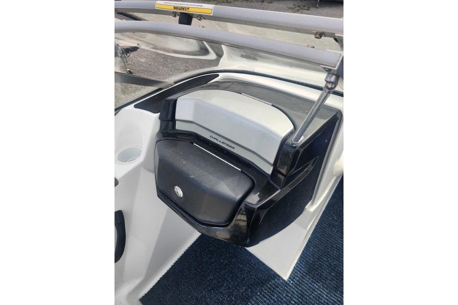 2012 Sea-Doo 180 Challenger boat dashboard with storage compartment and cup holder.