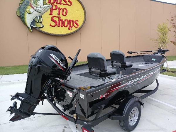 2025 Tracker Super Guide V-16 T boat at Bass Pro Shops, featuring a Mercury outboard motor.