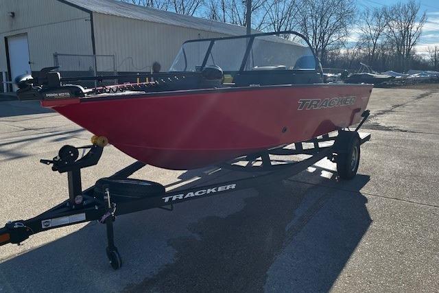 2026 Tracker Pro Guide V-175 WT boat on trailer, parked outdoors.