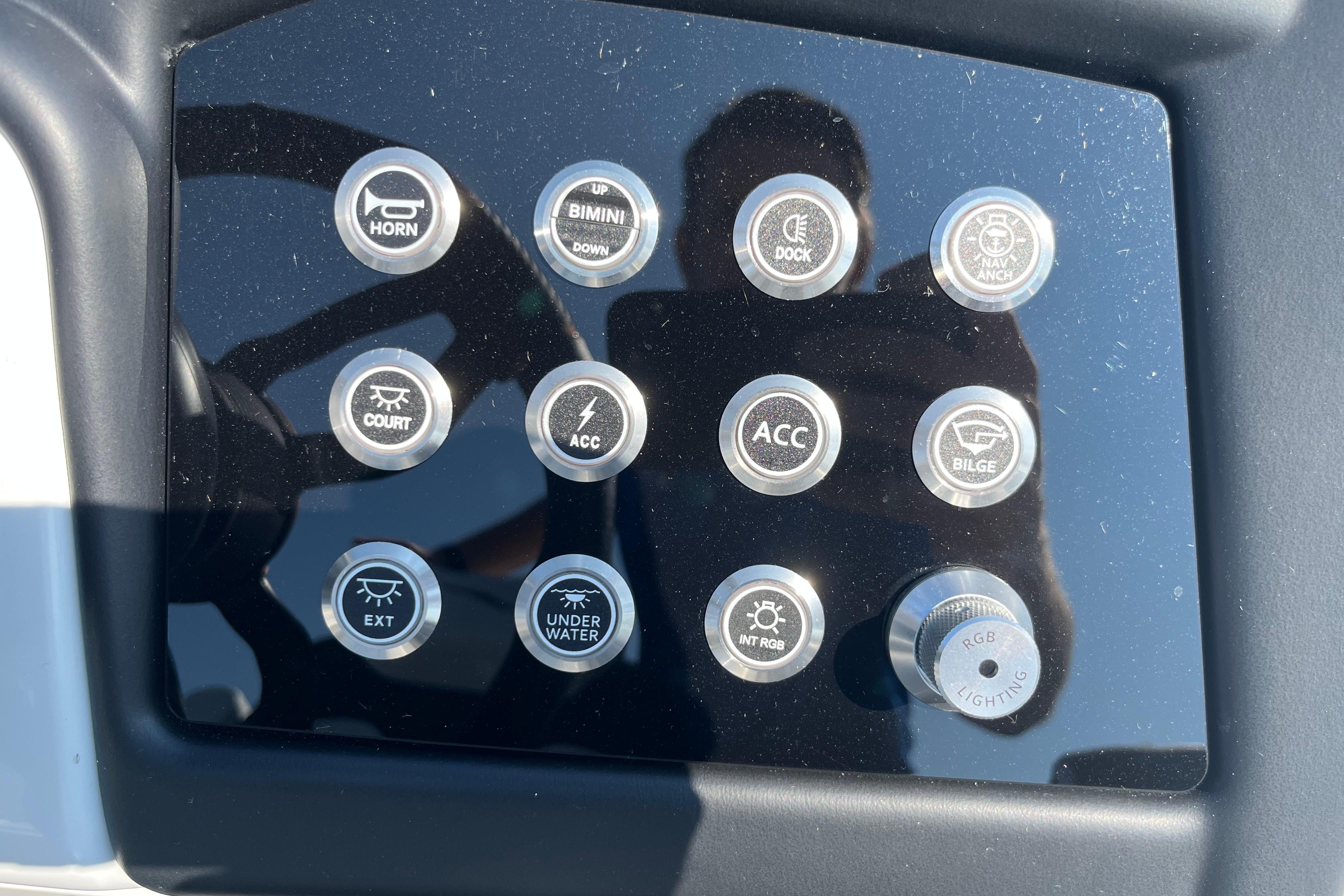 Control panel of 2026 Evotti 725CS boat with various function buttons.