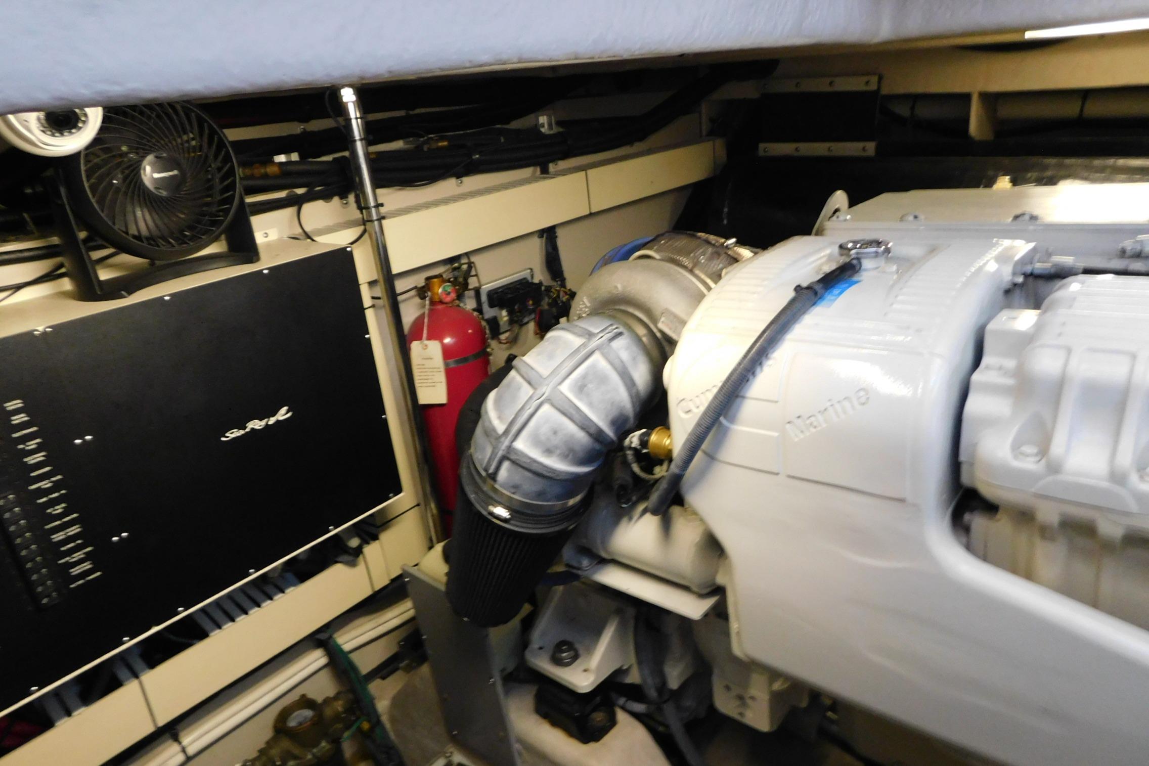 Engine room of 2004 Sea Ray 500 Sundancer with visible machinery and equipment.