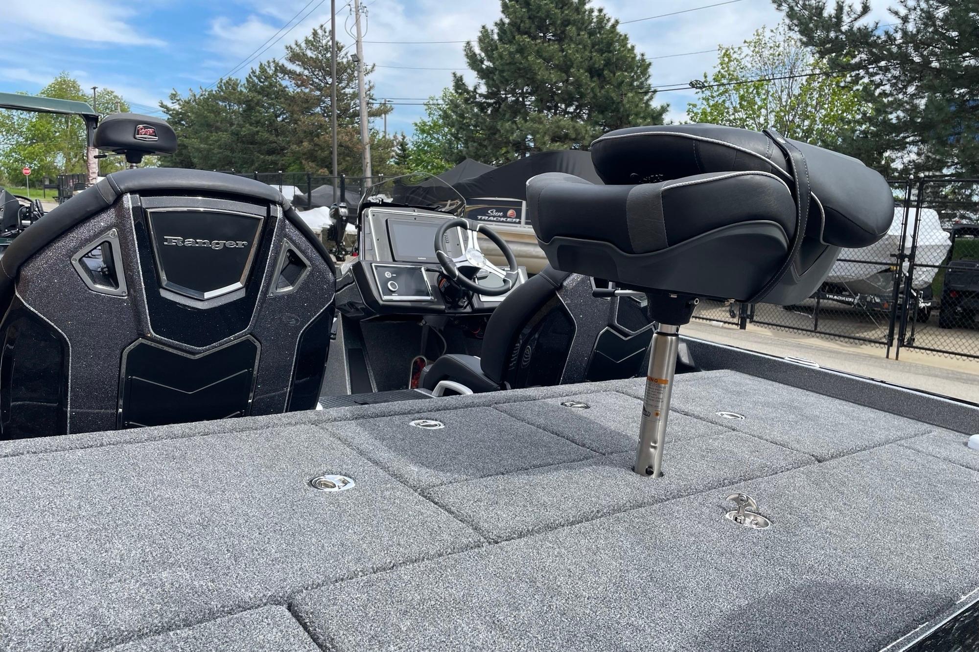 2026 Ranger Z520R boat interior with seating and control panel, outdoors.