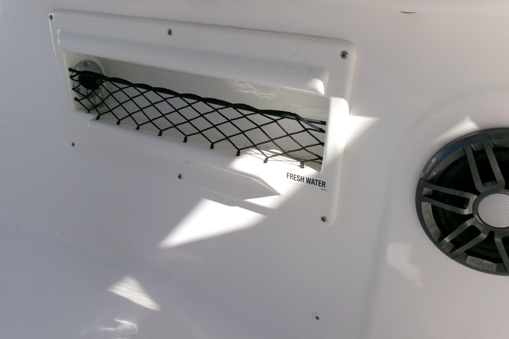 2026 Sea Fox 268 Commander boat interior with fresh water access and speaker.