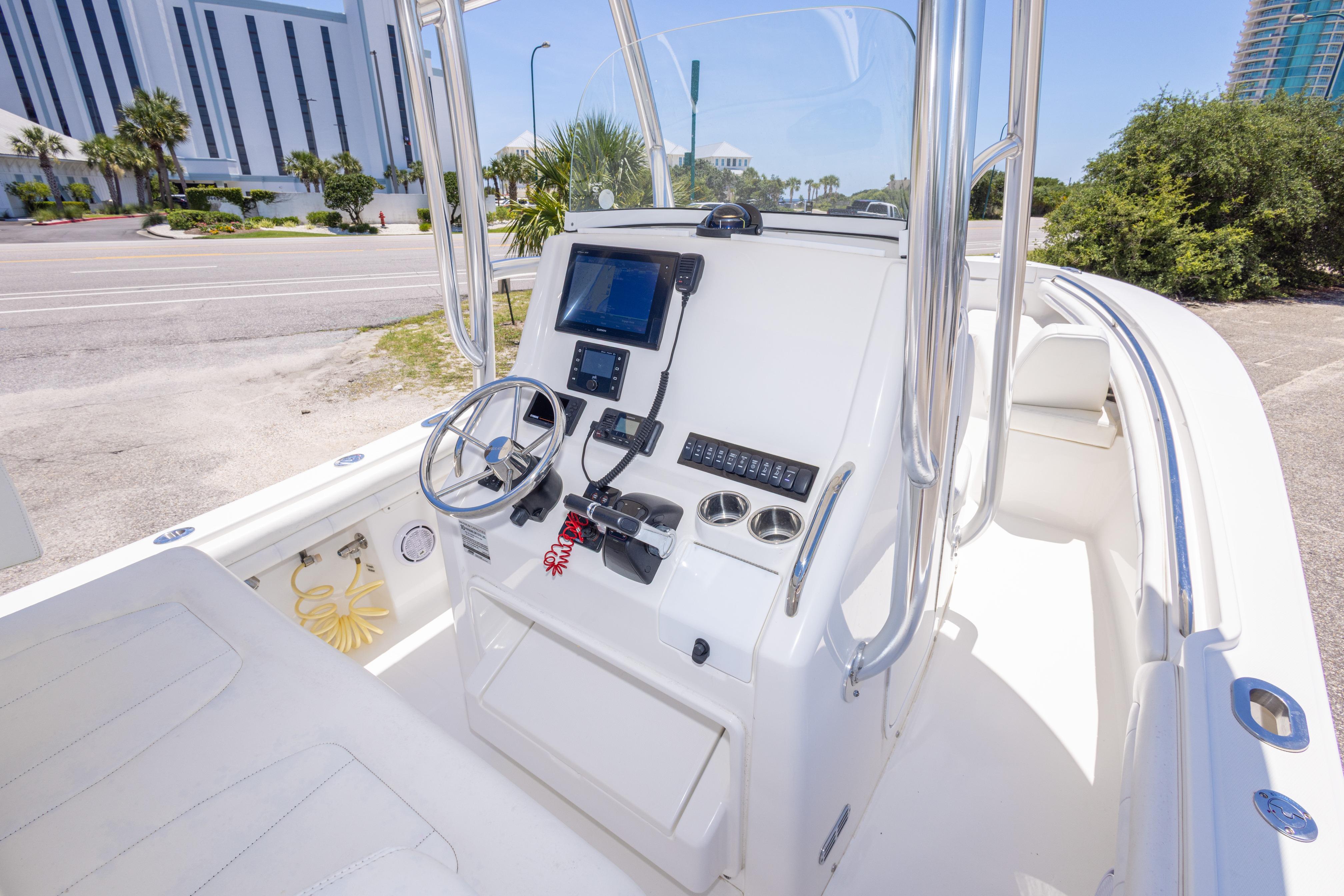 2019 Regulator 23 Center Console boat interior with steering wheel and navigation equipment.