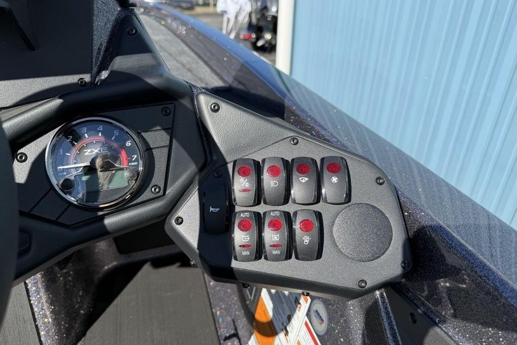Dashboard of 2026 Skeeter ZXE21 boat with control panel and gauges.