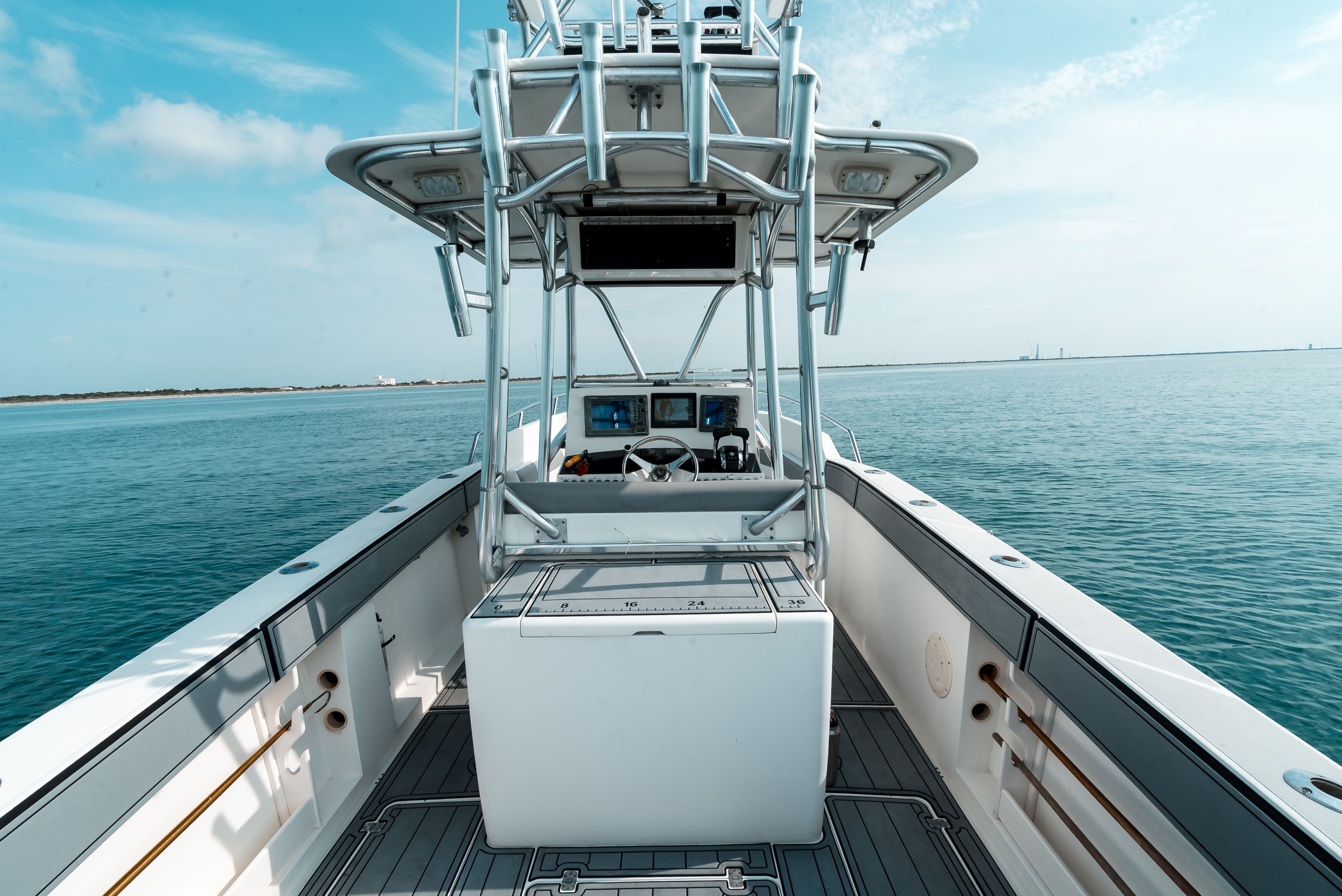 2006 Tempest Offshore 40 on calm water with clear views and modern equipment.