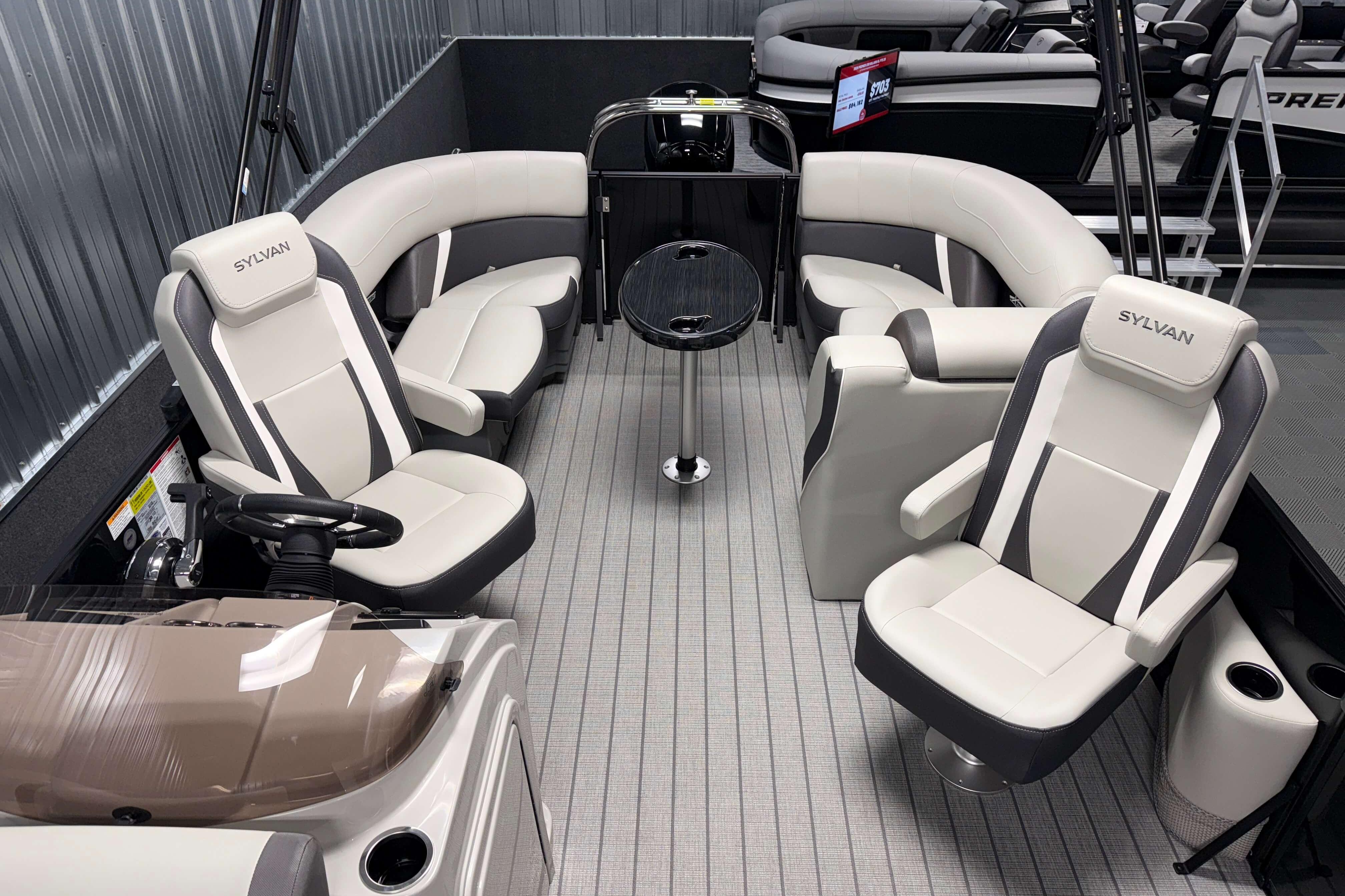 2026 Sylvan Mirage X1 boat interior with modern seating and sleek design.