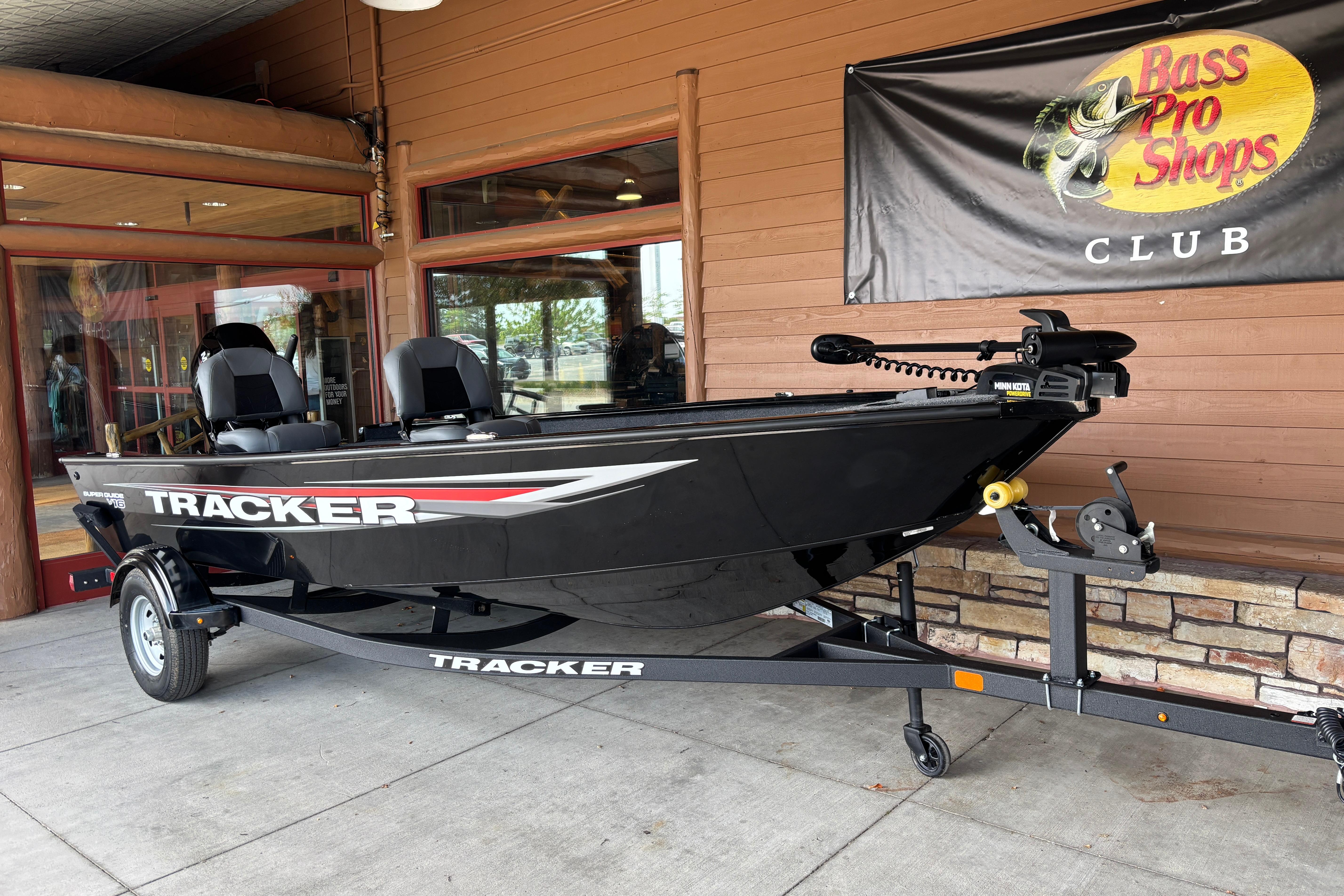 2026 Tracker Super Guide V-16 T boat displayed at Bass Pro Shops Club.
