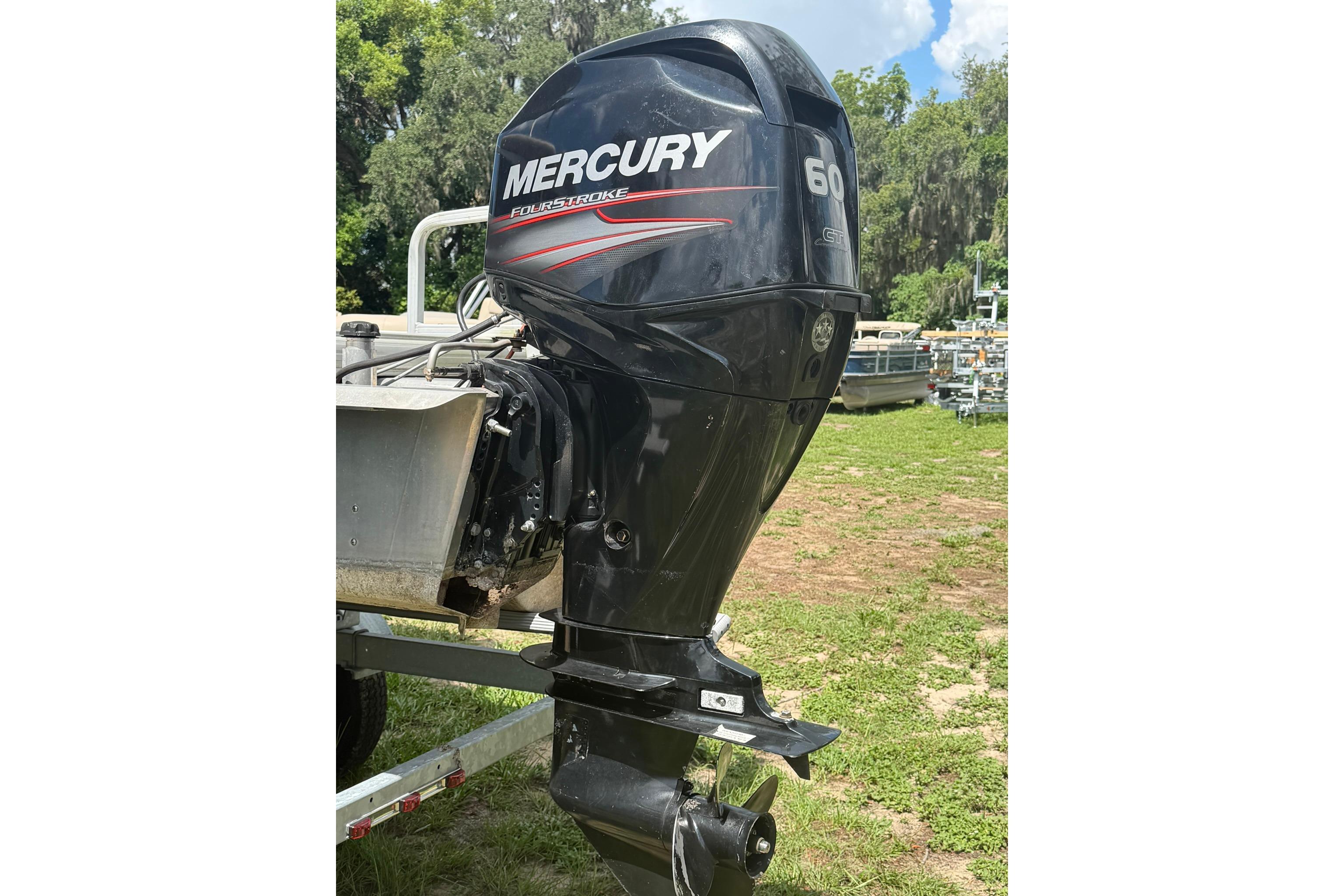 2016 SUNTRACKER Party Barge 20 with Mercury 60 horsepower outboard motor.