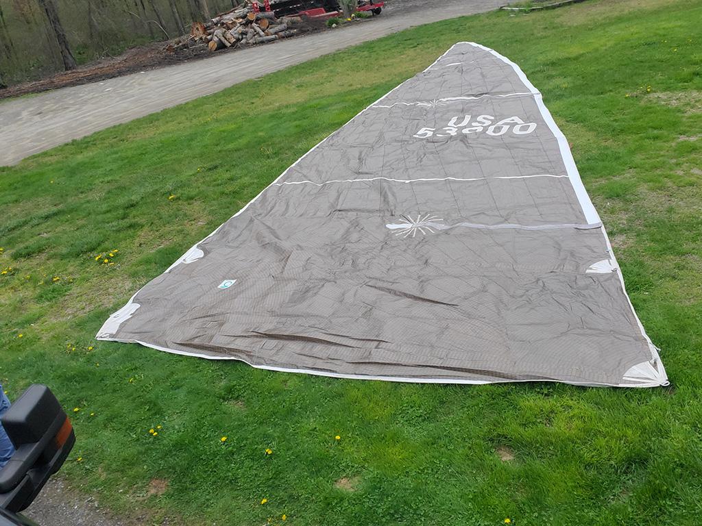 Sail from a 1991 Concordia Taylor 42 yacht laid out on grass.