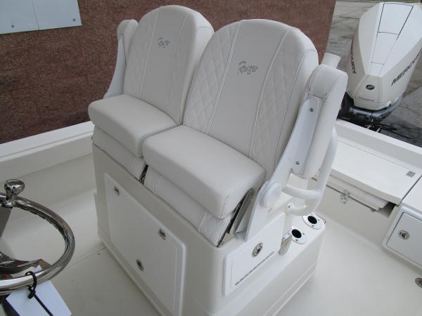 2024 Ranger 2360 Bay boat with dual white cushioned seats.