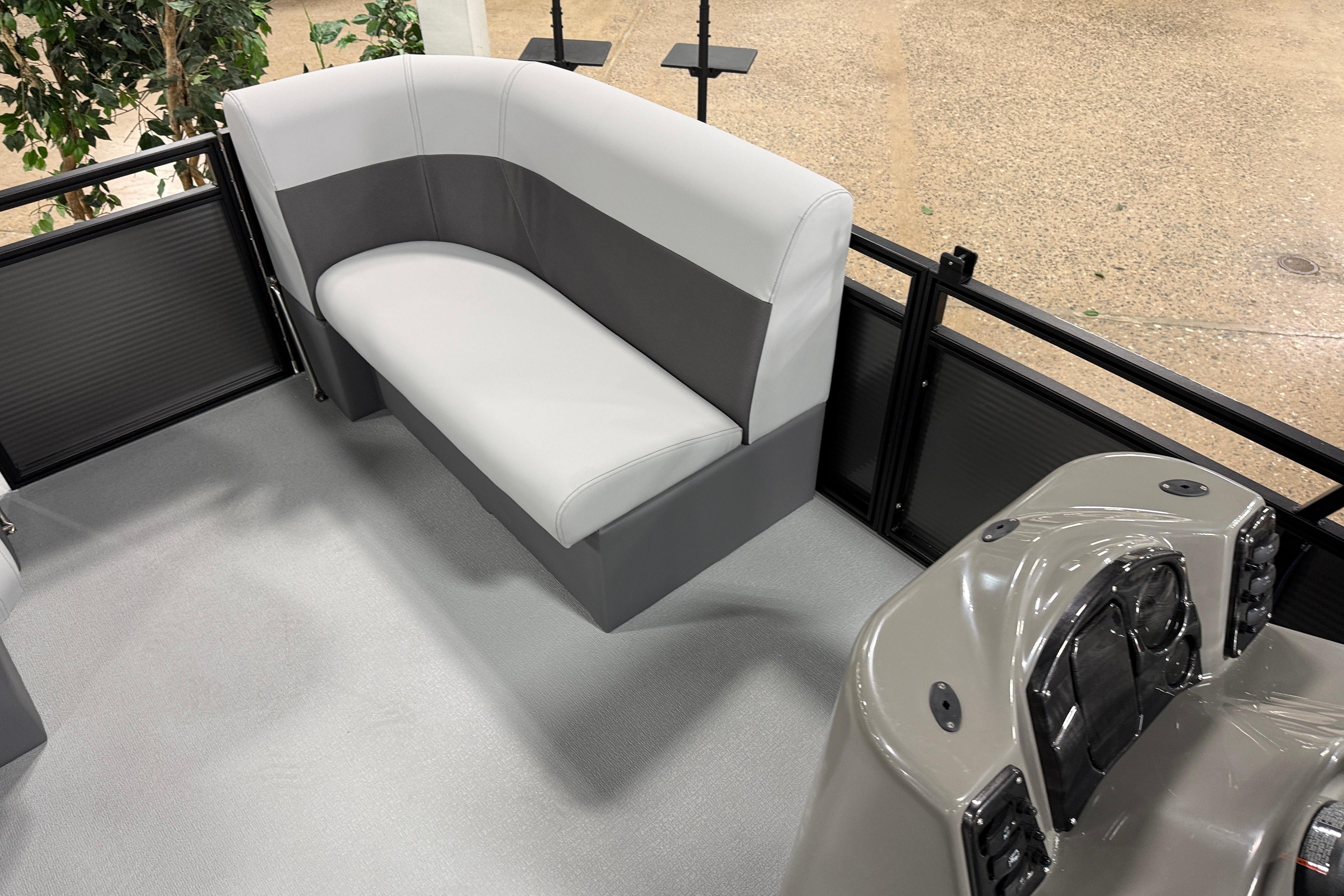 2026 Angler Quest 7515 Leisure Quest Cruise interior with gray seating and console.
