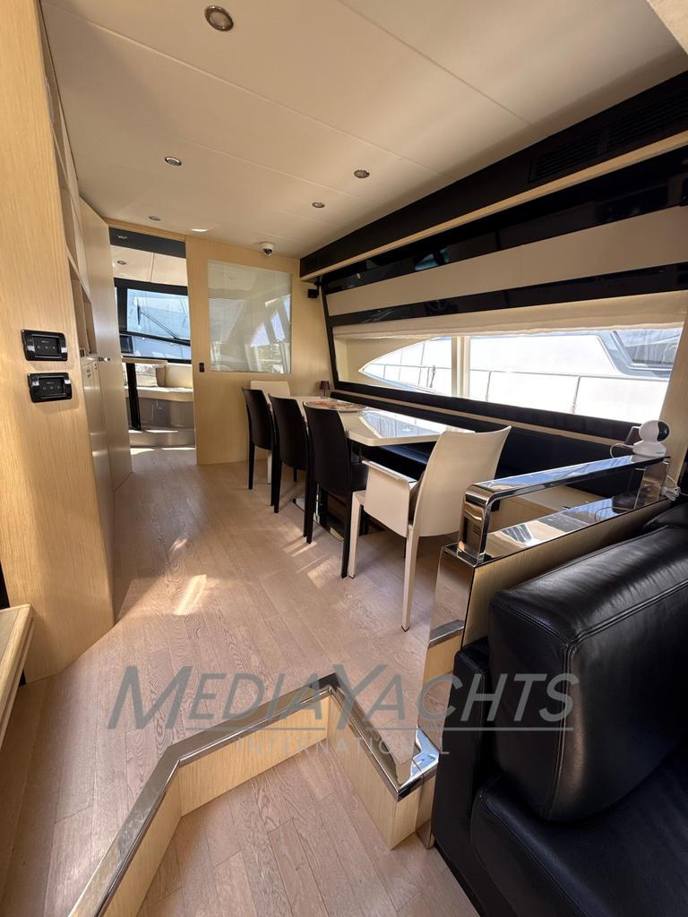 Luxurious interior of 2007 Riva Venere 75 yacht with elegant dining area.