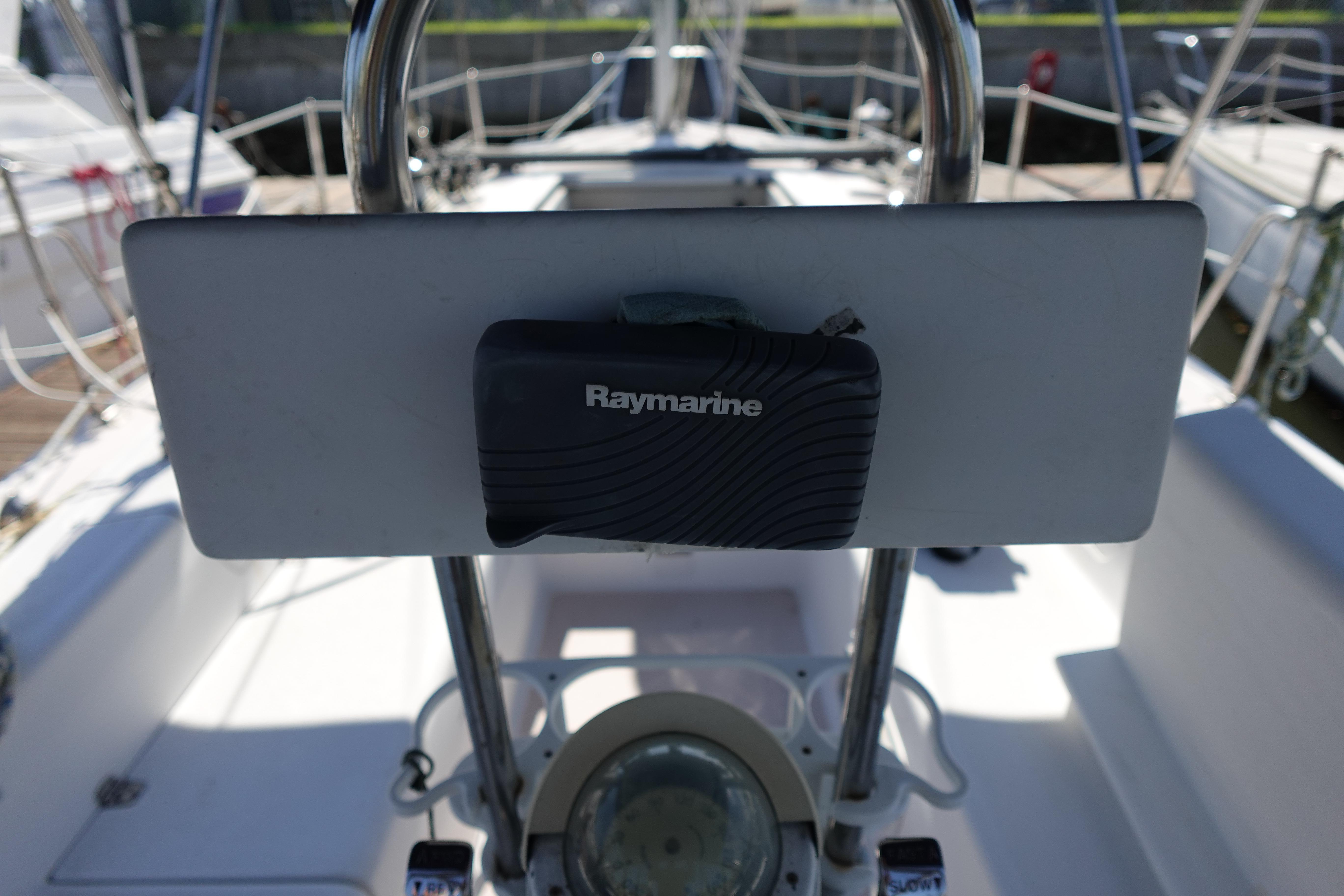 Cockpit of 1997 Catalina 28 sailboat with Raymarine navigation equipment.