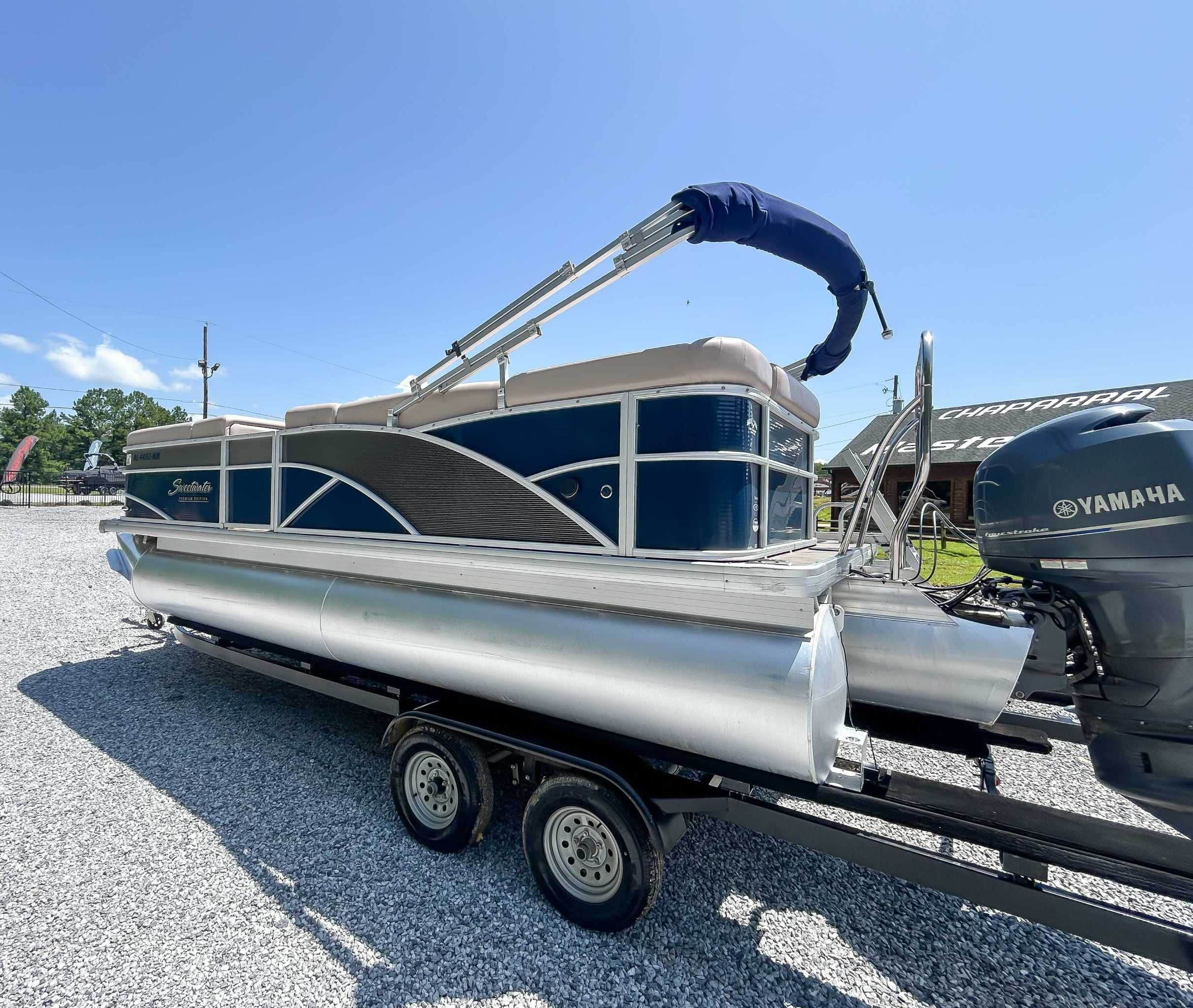 2014 Sweetwater 200 Premium Edition pontoon boat on trailer.