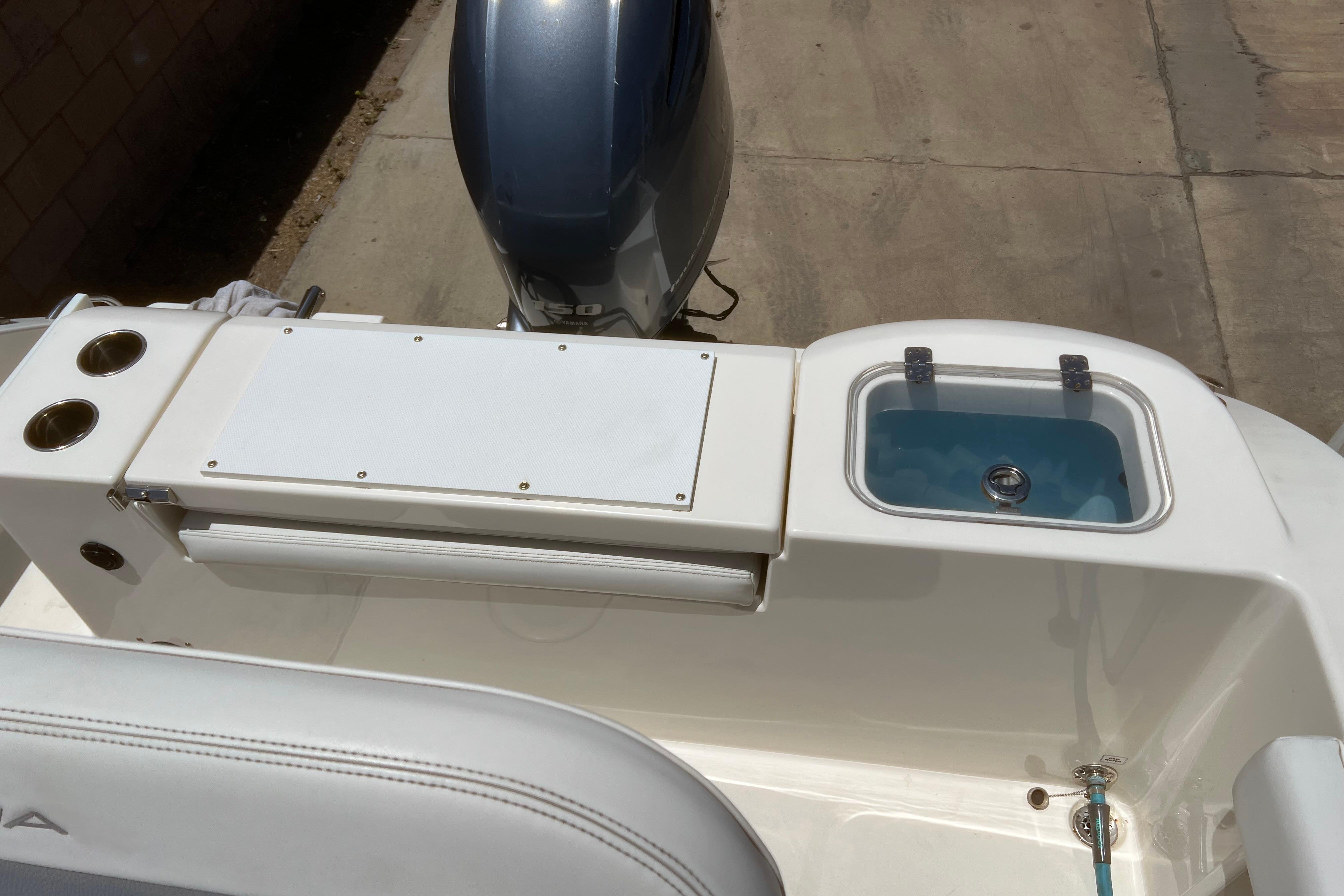 2018 Cobia 201 Center Console boat with motor and livewell.