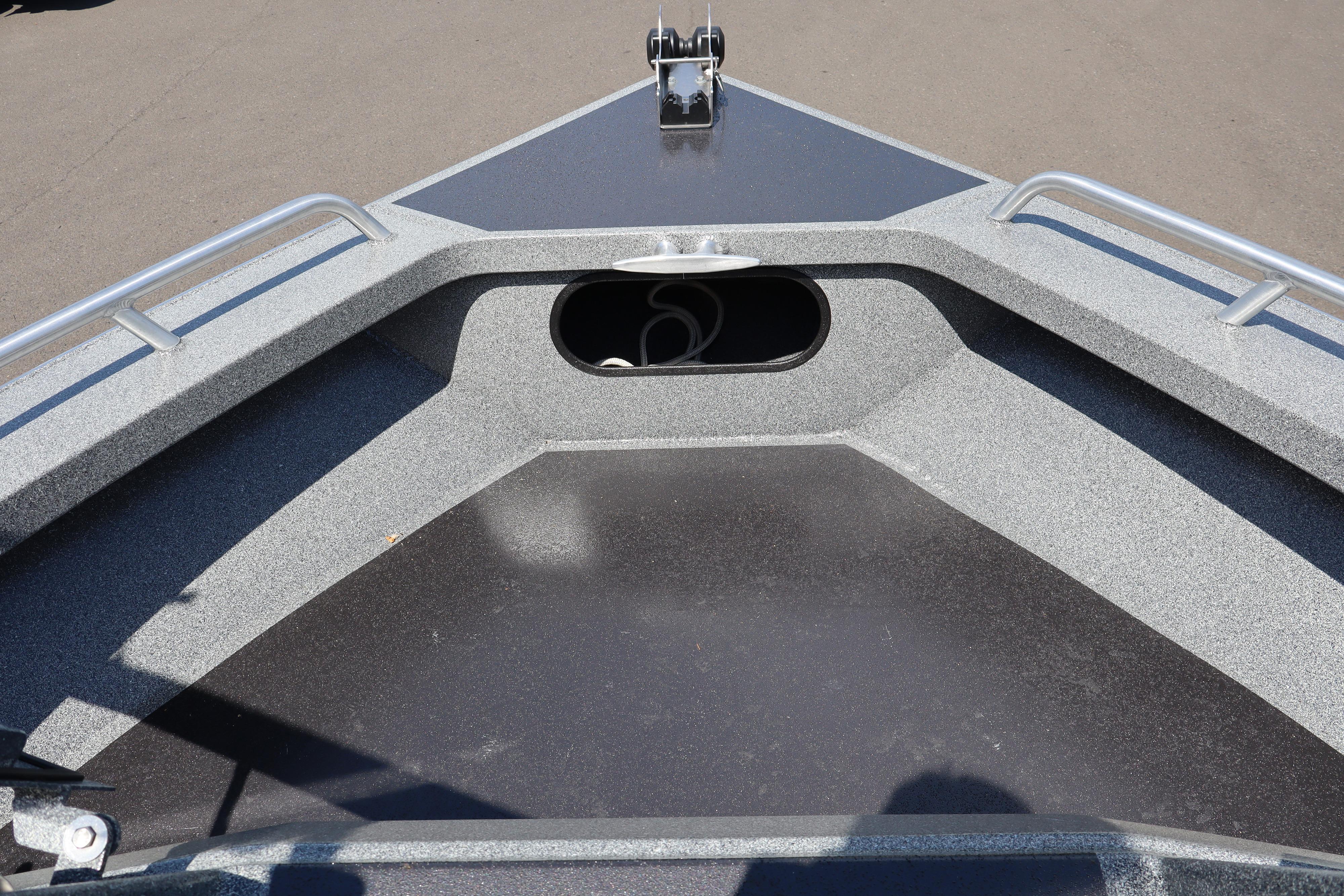 Bow of 2025 NorthRiver SEAHAWK boat with sleek design and sturdy railings.