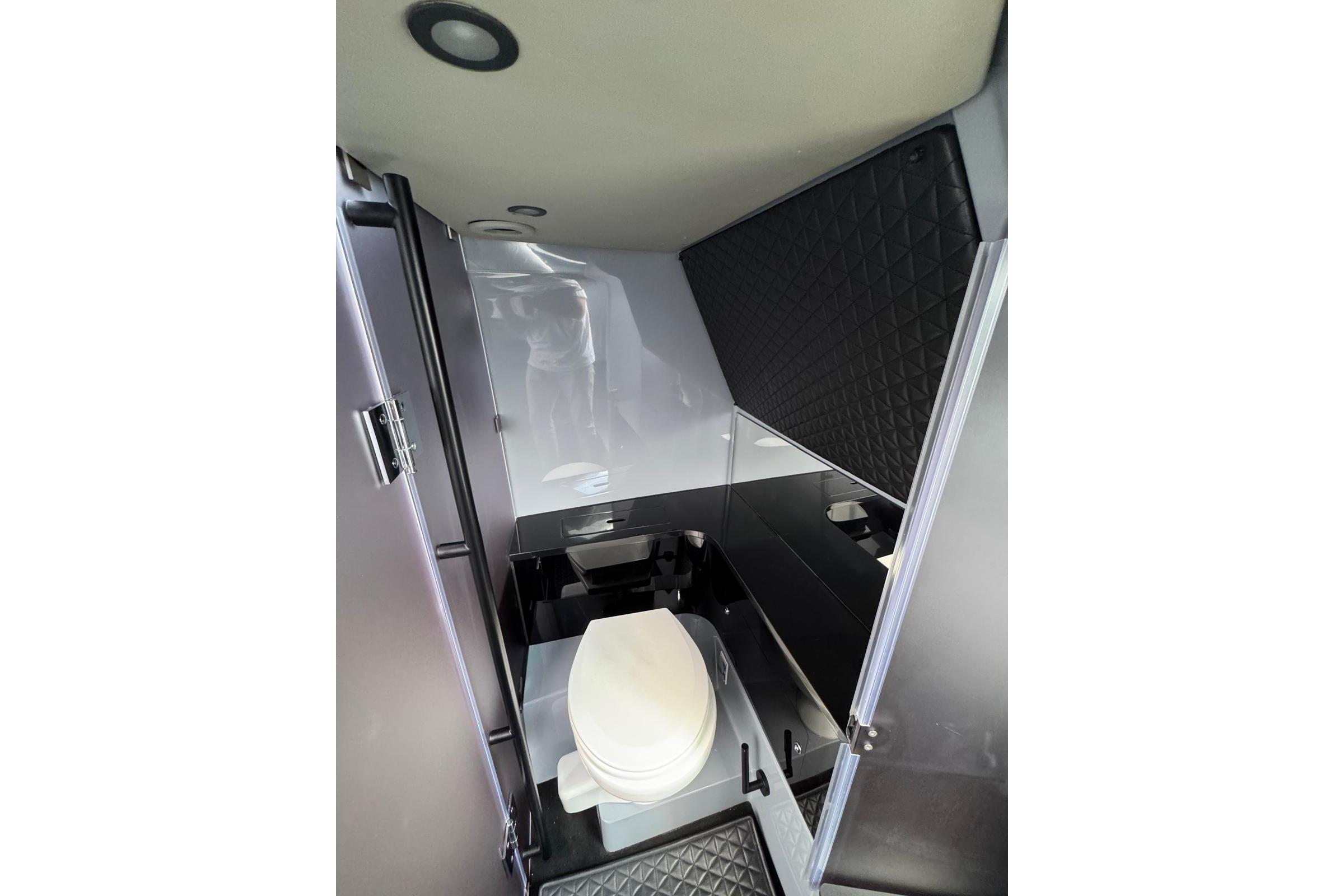 Interior of 2023 BRABUS Shadow 900 ST, featuring a modern bathroom design.