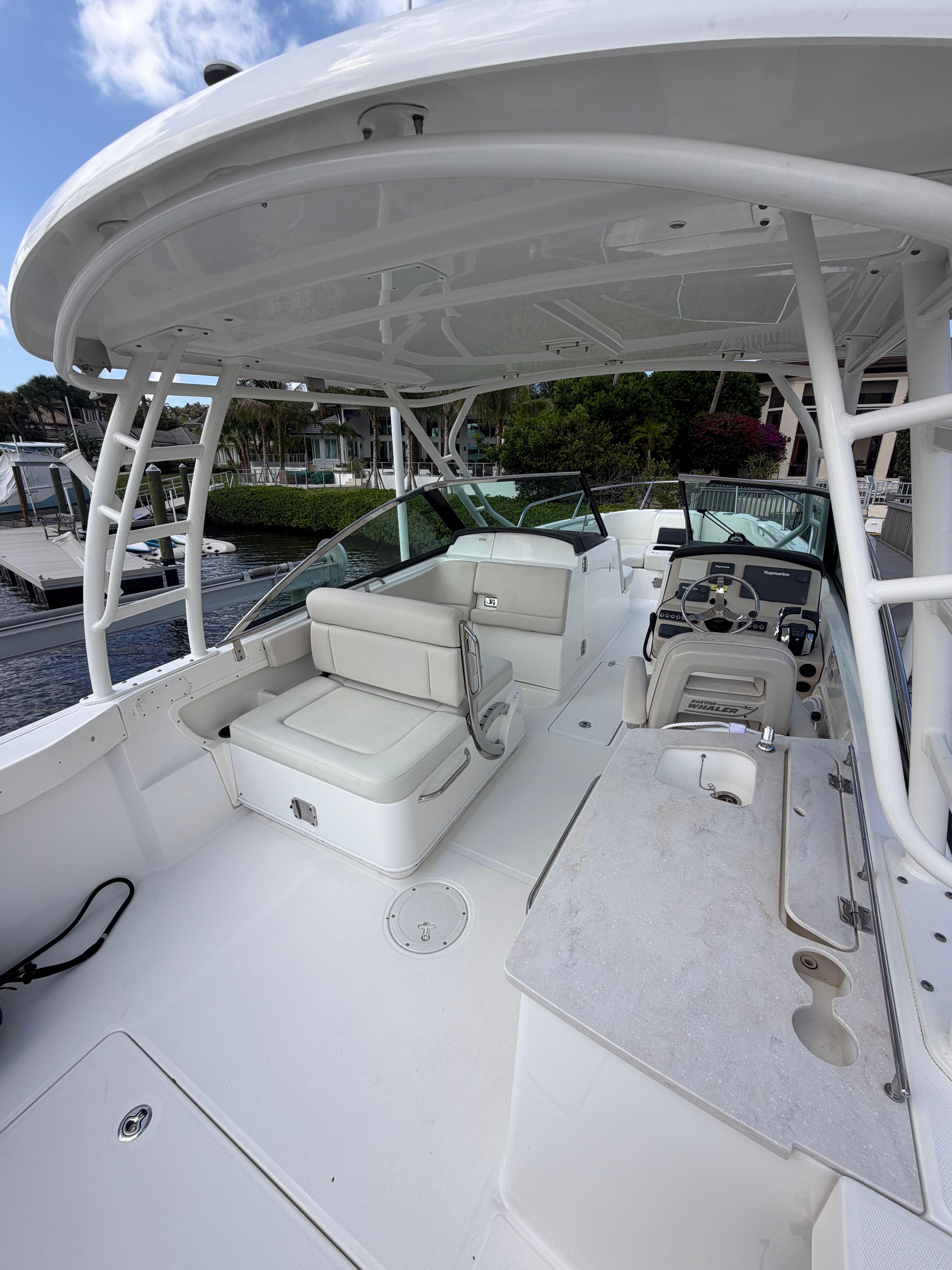 Interior of a 2016 Boston Whaler 270 Vantage boat at dock.