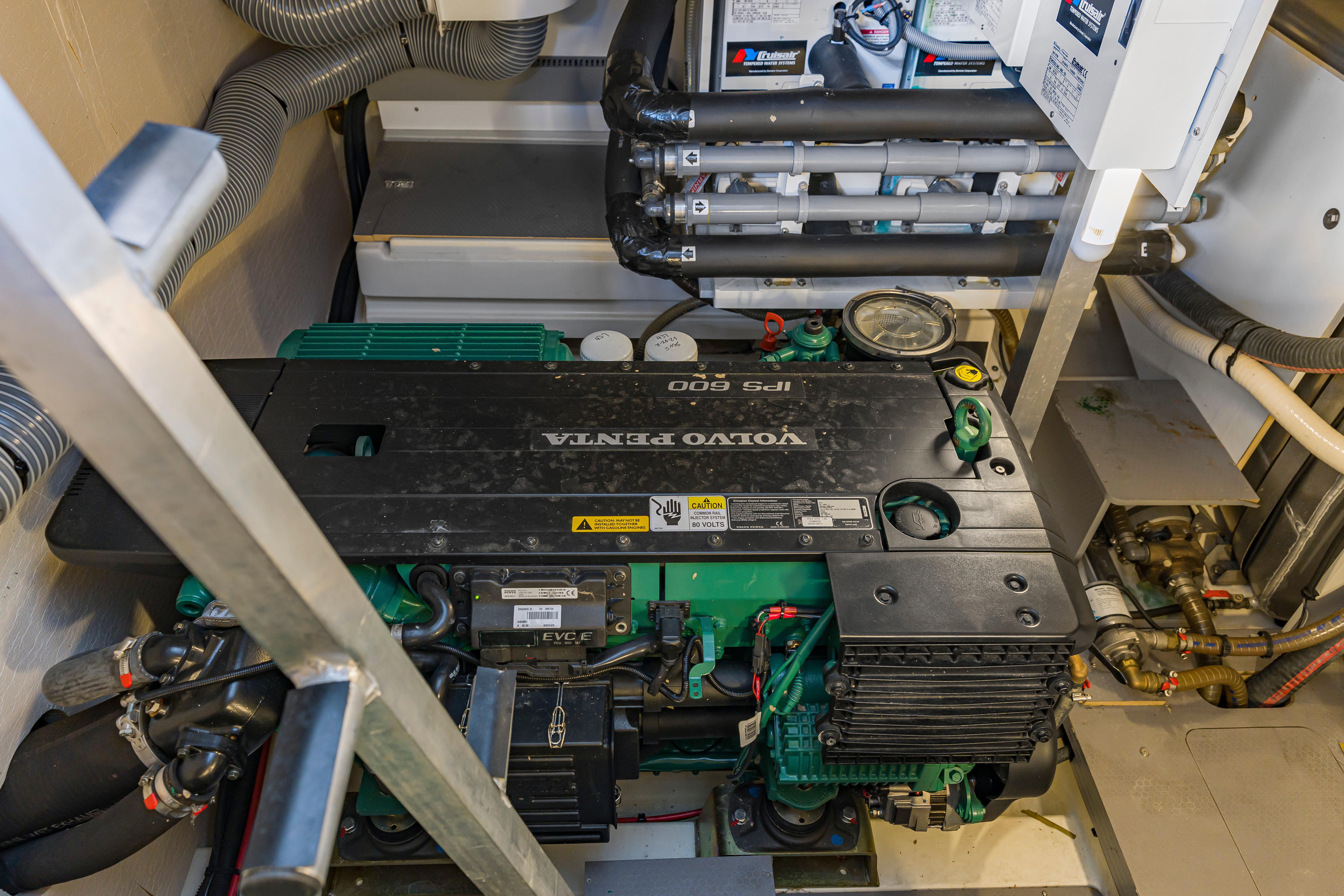 Engine room of a 2017 Prestige 500 yacht featuring a Volvo Penta IPS 600 engine.