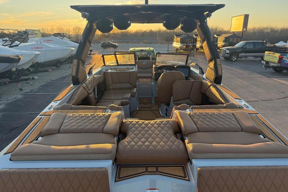 2026 Tigé Z3 boat interior with luxurious tan seating at sunset.