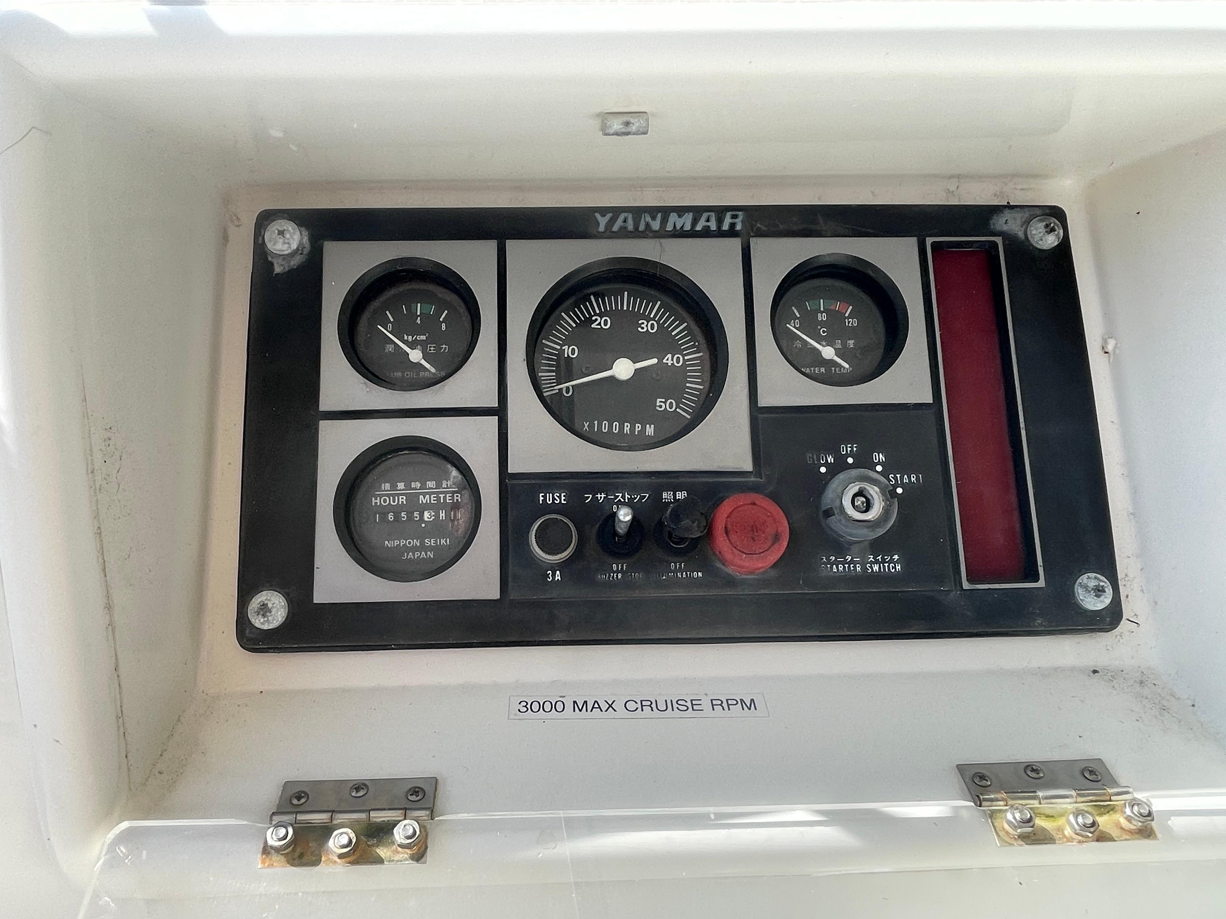 Control panel of a 1995 Passport 47 AC Plan B boat with Yanmar engine gauges.